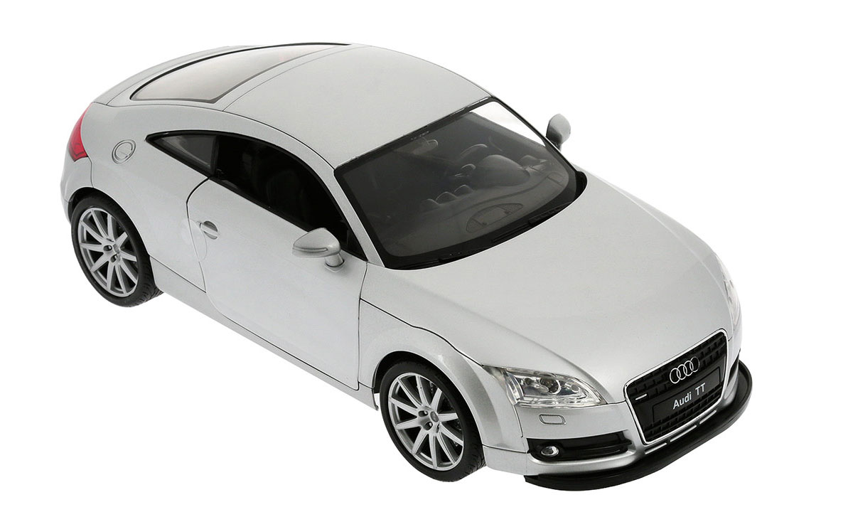 Welly Радиоуправляемая модель Audi TT Coupe82001 Welly Радиоуправляемая модель Audi TT Coupe82001Радиоуправляемая модель Welly Audi TT Coupe обязательно привлечет внимание взрослого и ребенка и понравится любому, кто увлекается автомобилями. Маневренная и реалистичная уменьшенная копия Audi TT Coupe выполнена в точной детализации с настоящим автомобилем в масштабе 1/12. Управление машинкой происходит с помощью пульта. Машинка двигается вперед и назад, поворачивает направо и налево. При движении загораются передние и задние фары. При помощи пульта у машинки открываются двери. Радиус действия пульта - 30 метров. Колеса игрушки прорезинены и обеспечивают плавный ход, машинка не портит напольное покрытие. Радиоуправляемые игрушки способствуют развитию координации движений, моторики и ловкости. Ваш ребенок часами будет играть с моделью, придумывая различные истории и устраивая соревнования. Порадуйте его таким замечательным подарком! Для работы машинки необходимо докупить 6 батареек напряжением 1,5V типа АА. Для работы пульта требуется 4 батарейки...