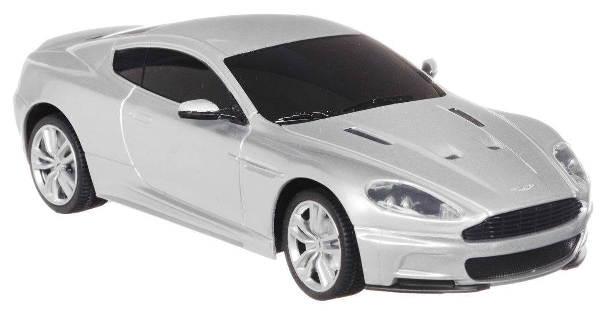 Rastar Радиоуправляемая модель Aston Martin DBS Coupe цвет серебристый масштаб 1:2440200 Rastar Радиоуправляемая модель Aston Martin DBS Coupe цвет серебристый масштаб 1:2440200Радиоуправляемая модель Rastar Aston Martin DBS Coupe станет отличным подарком любому мальчику! Все дети хотят иметь в наборе своих игрушек ослепительные, невероятные и крутые автомобили на радиоуправлении. Тем более, если это автомобиль известной марки с проработкой всех деталей, удивляющий приятным качеством и видом. Одной из таких моделей является автомобиль на радиоуправлении Rastar Aston Martin DBS Coupe. Это точная копия настоящего авто в масштабе 1/24. Авто обладает неповторимым провокационным стилем. Потрясающая маневренность, динамика и покладистость - отличительные качества этой модели. Возможные движения: вперед, назад, вправо, влево, остановка. При движении у машинки загораются фары. Пульт управления работает на частоте 27 MHz. Для работы игрушки необходимы 3 батарейки типа АА (не входят в комплект). Для работы пульта управления необходимы 2 батарейки типа АА (не входят в комплект).