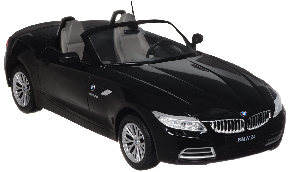 Rastar Радиоуправляемая модель BMW Z4 цвет черный масштаб 1:1240300 Rastar Радиоуправляемая модель BMW Z4 цвет черный масштаб 1:1240300Радиоуправляемая модель Rastar BMW Z4 обязательно привлечет внимание взрослого и ребенка и понравится любому, кто увлекается автомобилями. Все дети хотят иметь в наборе своих игрушек ослепительные, невероятные и крутые автомобили на радиоуправлении. Тем более если это автомобиль известной марки с проработкой всех деталей, удивляющий приятным качеством и видом. Маневренная и реалистичная уменьшенная копия BMW Z4 выполнена в точной детализации с настоящим автомобилем в масштабе 1:12. Управление машинкой происходит с помощью удобного пульта. Автомобиль двигается вперед и назад, поворачивает направо и налево. Автомобиль изготовлен из пластика с металлическими элементами. Колеса игрушки прорезинены и обеспечивают плавный ход, машинка не портит напольное покрытие. Радиоуправляемые игрушки способствуют развитию координации движений, моторики и ловкости. Ваш ребенок часами будет играть с моделью, придумывая различные истории и устраивая соревнования. Порадуйте его...