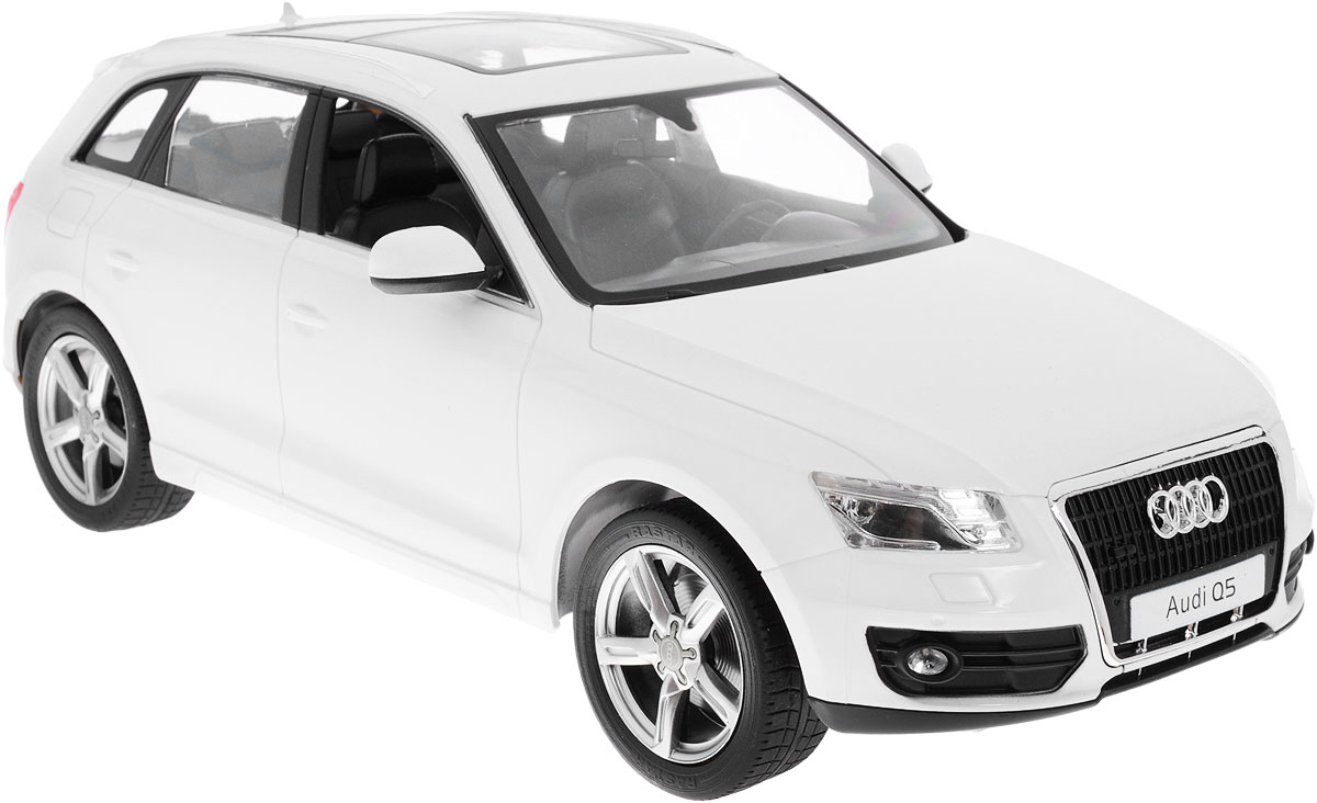 Rastar Радиоуправляемая модель Audi Q5 цвет белый масштаб 1:1438500 Rastar Радиоуправляемая модель Audi Q5 цвет белый масштаб 1:1438500Радиоуправляемая модель Rastar Audi Q5 станет отличным подарком любому мальчику! Все дети хотят иметь в наборе своих игрушек ослепительные, невероятные и модные автомобили на радиоуправлении. Тем более, если это автомобиль известной марки с проработкой всех деталей, удивляющий приятным качеством и видом. Одной из таких моделей является автомобиль на радиоуправлении Rastar Audi Q5. Это точная копия настоящего авто в масштабе 1:14. Авто обладает неповторимым провокационным стилем и спортивным характером. Потрясающая маневренность, динамика и покладистость - отличительные качества этой модели. Возможные движения: вперед, назад, вправо, влево, остановка. При движении загораются фары и стоп-сигналы. Машина работает от 5 батареек типа АА напряжением 1,5V, пульт работает от батарейки 9V типа Крона (не входят в комплект).