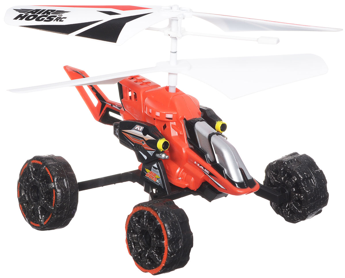 Air Hogs Машина-вертолет на инфракрасном управлении Hover Assault Eject цвет красный44404_красный Air Hogs Машина-вертолет на инфракрасном управлении Hover Assault Eject цвет красный44404_красныйМашина-вертолет на инфракрасном управлении AirHogs Hover Assault Eject станет отличным подарком любому мальчишке! Машина-вертолет - очередное чудо техники от AirHogs. Этот уникальный вертолет может легко трансформироваться в машину с большими колесами, путем присоединения колесной базы. За счет вращения винтов она может двигаться либо по земле (вперед, влево, вправо), либо летать, как настоящий вертолет. Кроме того, при нажатии кнопки на пульте стреляет ракетами, находясь на земле или в воздухе. К игрушке прилагаются 6 патронов - вертолет может стрелять по мишеням! Управление вертолетом осуществляется с помощью 3-канального инфракрасного пульта управления. Встроенный гироскоп обеспечит ровность полета. Игрушка работает от встроенного аккумулятора. Для работы пульта управления необходимы 6 батареек напряжением 1,5 V типа АА (не входят в комплект).