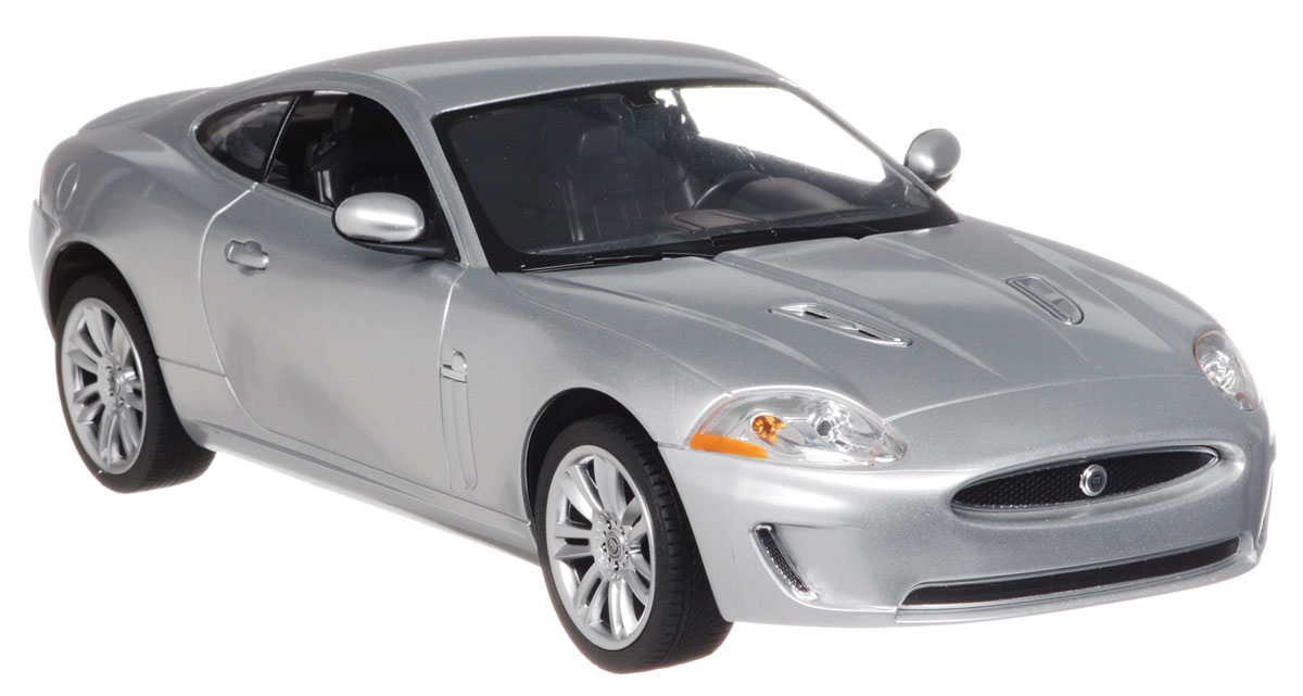 Rastar Радиоуправляемая модель Jaguar XKR цвет серебристый42200 Rastar Радиоуправляемая модель Jaguar XKR цвет серебристый42200Радиоуправляемая модель Rastar Jaguar XKR обязательно привлечет внимание взрослого и ребенка и понравится любому, кто увлекается автомобилями. Все дети хотят иметь в наборе своих игрушек ослепительные, невероятные и крутые автомобили на радиоуправлении. Тем более если это автомобиль известной марки с проработкой всех деталей, удивляющий приятным качеством и видом. Маневренная и реалистичная уменьшенная копия Jaguar XKR выполнена в точной детализации с настоящим автомобилем в масштабе 1:14. Управление машинкой происходит с помощью удобного пульта. Автомобиль двигается вперед и назад, поворачивает направо и налево. Автомобиль изготовлен из пластика с металлическими элементами, при движении загораются фары. Колеса игрушки прорезинены и обеспечивают плавный ход, машинка не портит напольное покрытие. Радиоуправляемые игрушки способствуют развитию координации движений, моторики и ловкости. Ваш ребенок часами будет играть с моделью, придумывая различные истории и...