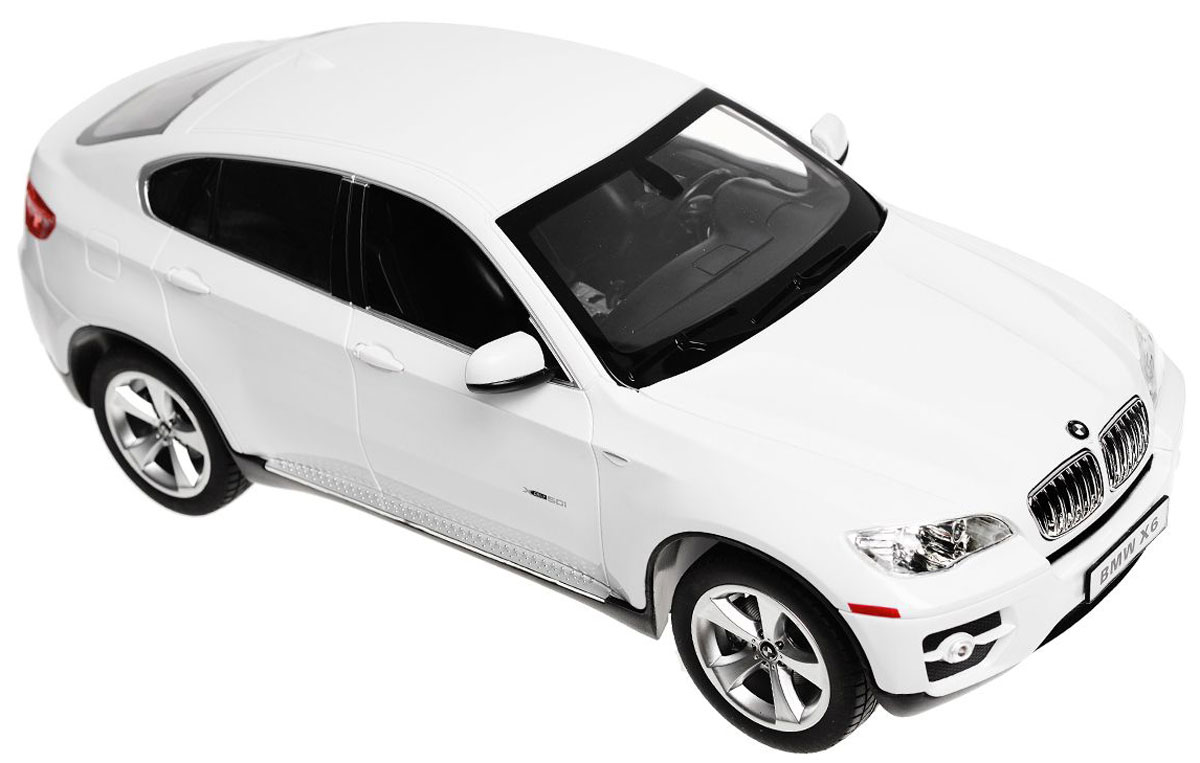 Rastar Радиоуправляемая модель BMW X6 цвет белый масштаб 1:1431400 Rastar Радиоуправляемая модель BMW X6 цвет белый масштаб 1:1431400Радиоуправляемая модель Rastar BMW X6 обязательно привлечет внимание взрослого и ребенка и понравится любому, кто увлекается автомобилями. Все дети хотят иметь в наборе своих игрушек ослепительные, невероятные и модные автомобили на радиоуправлении. Тем более, если это автомобиль известной марки с проработкой всех деталей, удивляющий приятным качеством и видом. Одной из таких моделей является автомобиль на радиоуправлении Rastar BMW X6. Это точная копия настоящего авто в масштабе 1:14. Авто обладает неповторимым провокационным стилем и спортивным характером. Потрясающая маневренность, динамика и покладистость - отличительные качества этой модели. Возможные движения: вперед, назад, вправо, влево, остановка. При движении загораются фары и стоп-сигналы. Машина работает от 5 батареек типа АА напряжением 1,5V, пульт работает от батарейки 9V типа Крона (не входят в комплект).