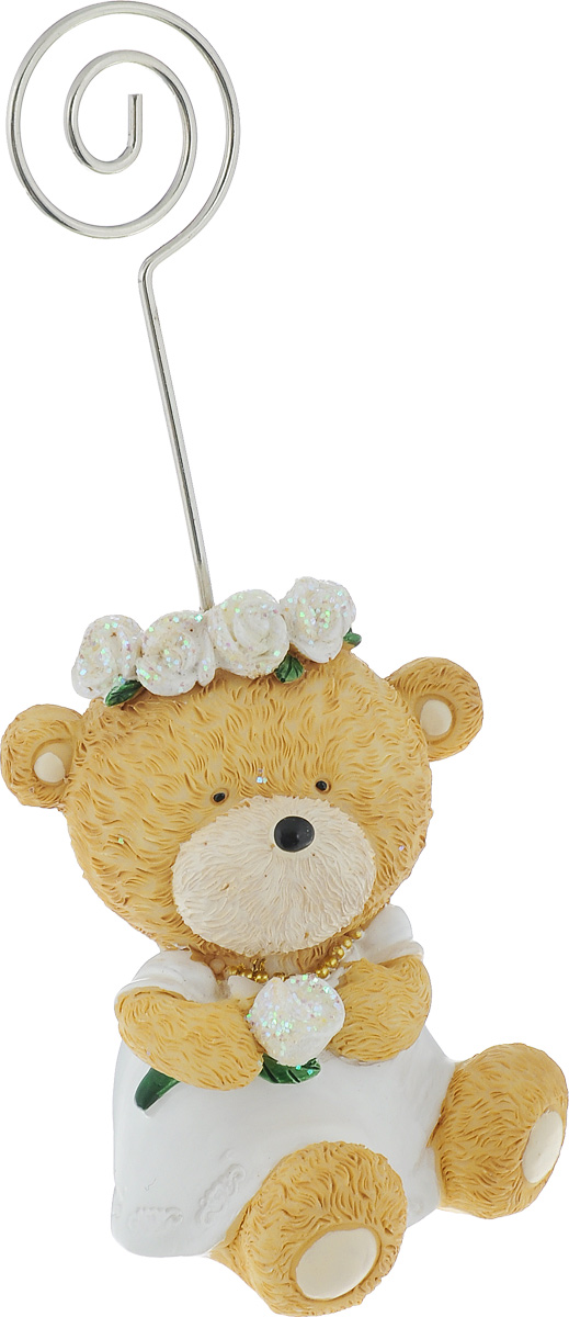 Держатель для карточек Home Queen Молодожены. Невеста, 5,5 x 5 x 6,5 см64036_ невеста Держатель для карточек Home Queen Молодожены. Невеста, 5,5 x 5 x 6,5 см64036_ невестаДержатель для карточек Home Queen Молодожены. Невеста станет отличным подарком и необычным украшением интерьера. Держатель выполнен в виде медведя в свадебном наряде и предназначен для крепления визиток, карточек, записок, фото. Расположив такой необычный предмет на своем рабочем столе или на полке, обладатель данного аксессуара непременно подчеркнет свое стремление оставаться модным и стильным в каждой детали. Сочетание оригинального дизайна и хорошего качества позволит представить такой подарок в самом выигрышном свете. Размер статуэтки (без учета держателя): 5,5 см х 5 см х 6,5 см.