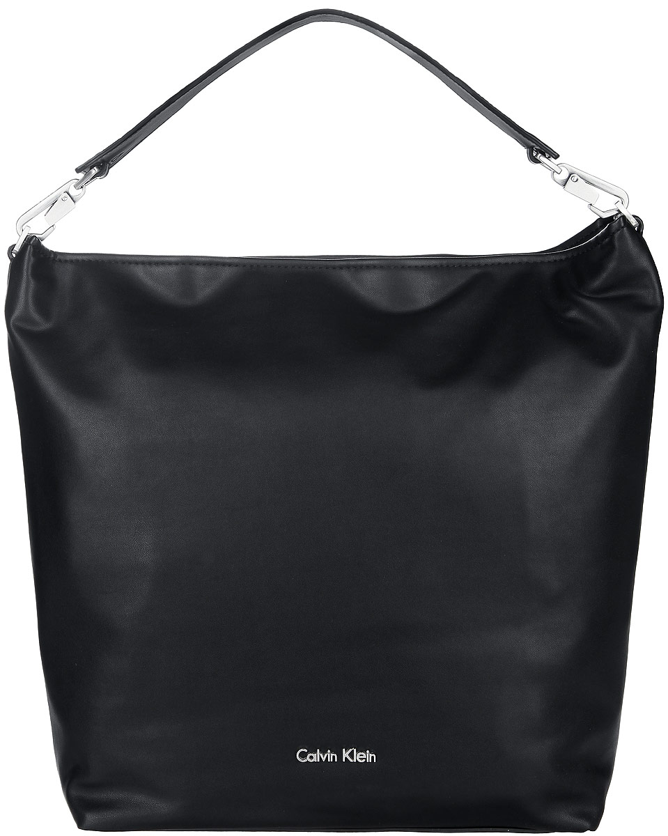 Сумка женская Calvin Klein Jeans, цвет: черный. K60K601383K60K601383 Сумка женская Calvin Klein Jeans, цвет: черный. K60K601383K60K601383Стильная женская сумка Calvin Klein выполнена из полиуретана, оформлена металлической фурнитурой с символикой бренда. Изделие содержит одно вместительное отделение и закрывается на молнию. Внутри расположены два накладных кармана и врезной карман на молнии. Сумка оснащена съемной широкой лямкой для переноски. Оригинальный аксессуар от Calvin Klein позволит вам завершить образ и быть неотразимой.