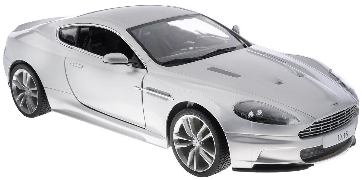 Rastar Радиоуправляемая модель Aston Martin DBS Coupe цвет серебристый масштаб 1:1052200 Rastar Радиоуправляемая модель Aston Martin DBS Coupe цвет серебристый масштаб 1:1052200Радиоуправляемая модель Rastar Aston Martin DBS Coupe - отличный подарок любому мальчику! Все дети хотят иметь в наборе своих игрушек ослепительные, невероятные и крутые автомобили на радиоуправлении. Тем более, если это автомобиль известной марки с проработкой всех деталей, удивляющий приятным качеством и видом. Одной из таких моделей является автомобиль на радиоуправлении Rastar Aston Martin DBS Coupe. Это точная копия настоящего авто в масштабе 1:10. Двери машины открываются. Возможные движения: вперед, назад, вправо, влево, остановка. Имеются световые эффекты. Пульт управления работает на частоте 27 MHz. Машина работает на сменном аккумуляторе (входит в комплект), который заряжается при помощи зарядного устройства (входит в комплект). Для работы пульта управления необходима батарейка 9V (6F22) (не входит в комплект).