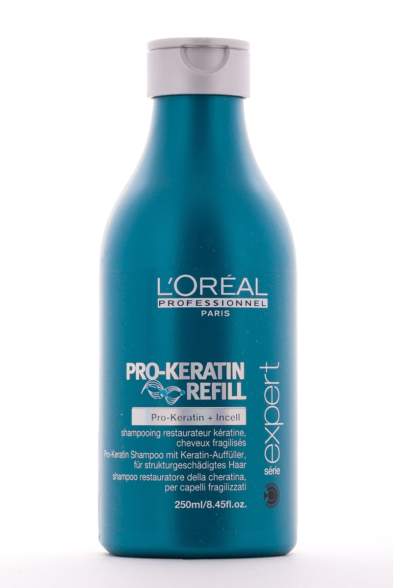 LOreal Professionnel Восстанавливающий и укрепляющий шампунь для поврежденных волос Expert Pro-Keratin Refill Shampoo - 250 млE0528 LOreal Professionnel Восстанавливающий и укрепляющий шампунь для поврежденных волос Expert Pro-Keratin Refill Shampoo - 250 млE0528Шампунь Pro-Keratin Refill предназначен для регулярного применения. Содержит микроэлементы, глубоко проникающие в структуру волоса, а также обволакивает волос микропленкой, которая защищает его от вредного воздействия извне и предотвращает вымывание полезных веществ. Укрепляет волосяной фолликул и уплотняет волосы. Препятствуя чрезмерному выпадению волос, способствуя здоровому росту волос. Устраняет нежелательную пушистость и делает волосы послушными. Придает дополнительный блеск, необходимую гладкость и шелковистость. Восстанавливает поврежденные чешуйки волос, интенсивно питает, защищает от негативного воздействия среды. Благодаря регулярному применению шампуня LOreal Professionnel Pro-Keratin Refill Shampoo, ваши волосы вновь обретут природную силу, здоровое сияние, став более крепкими, густыми и сияющими. Активные компоненты: Pro-кератин, молекулы Incell, протеины пшеницы, аргинин, фруктовые экстракты. Применение: После использования шампуня подсушите волосы полотенцем. Аккуратно...