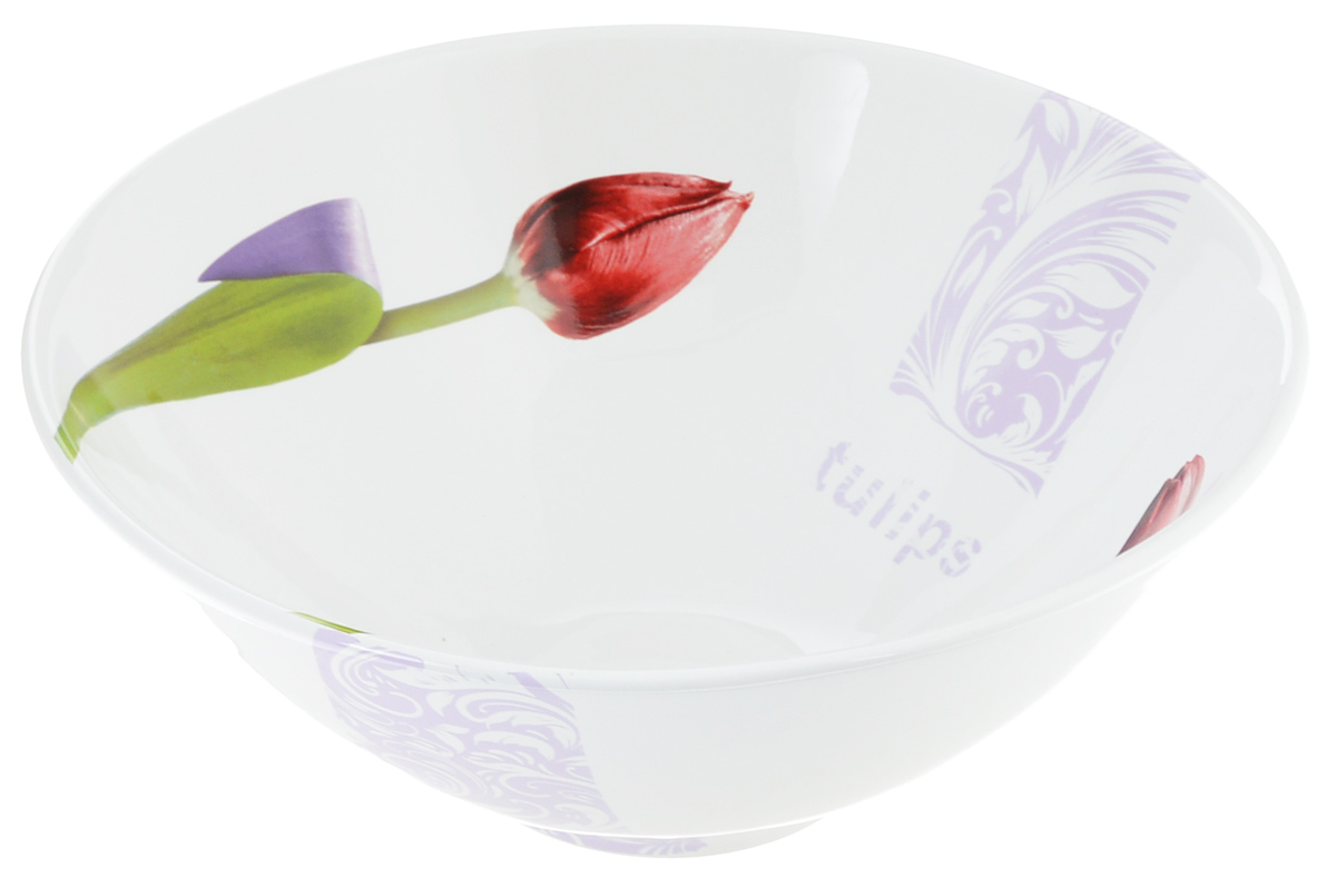 Салатник Ceramiche Viva Тюльпаны, диаметр 25 см7911.1 Салатник Ceramiche Viva Тюльпаны, диаметр 25 см7911.1Салатник Ceramiche Viva Тюльпаны изготовлен из высококачественной керамики, покрытой слоем сверкающей глазури. Изделие декорировано красочным изображением красных тюльпанов и красивым орнаментом сиреневого оттенка. Такой салатник замечателен для салатов, закусок, горячих блюд, гарниров. Он прекрасно дополнит сервировку стола и порадует вас оригинальным дизайном. Допускается мытье в посудомоечной машине, а также использование для разогрева блюд в СВЧ-печи. Диаметр салатника (по верхнему краю): 25 см. Высота салатника: 10 см.
