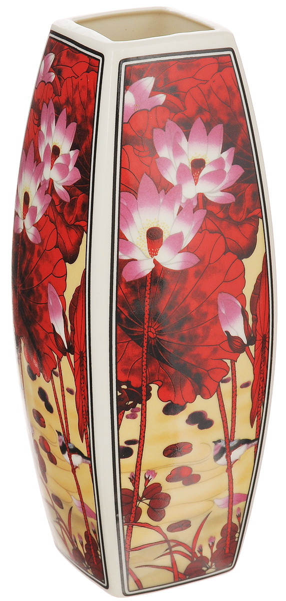 Ваза Elan Gallery Цветок лотоса, высота 21 см501909 Ваза Elan Gallery Цветок лотоса, высота 21 см501909Декоративная ваза Elan Gallery Цветок лотоса украсит ваш интерьер и будет прекрасным подарком для ваших близких! Изделие выполнено из высококачественного фарфора и оформлено цветочным рисунком. Оригинальный дизайн наполнит ваш дом праздничным настроением. Изделие имеет подарочную упаковку, поэтому станет желанным подарком для ваших близких! Размер по верхнему краю: 5,2 см х 5,2 см. Размер дна: 5,3 см х 5,3 см. Высота вазы: 21 см.