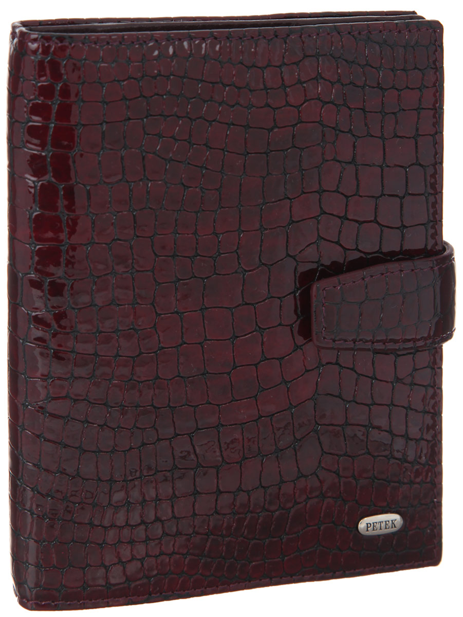 Обложка для документов Petek 1855, цвет: бордовый. 595.091.03595.091.03 Burgundy Обложка для документов Petek 1855, цвет: бордовый. 595.091.03595.091.03 BurgundyСтильная обложка для документов Petek 1855 изготовлена из натуральной лаковой кожи с декоративным фактурным тиснением под кожу рептилии, оформлена металлической пластиной с символикой бренда. Изделие закрывается хлястиком на кнопку. Внутри содержит отделение для паспорта и отделение для автодокуменов. В отделении для автодокументов расположен вкладыш, включающий в себя шесть файлов. Изделие поставляется в фирменной упаковке. Практичная и удобная модель для тех, кто предпочитает все необходимое хранить в одном месте.