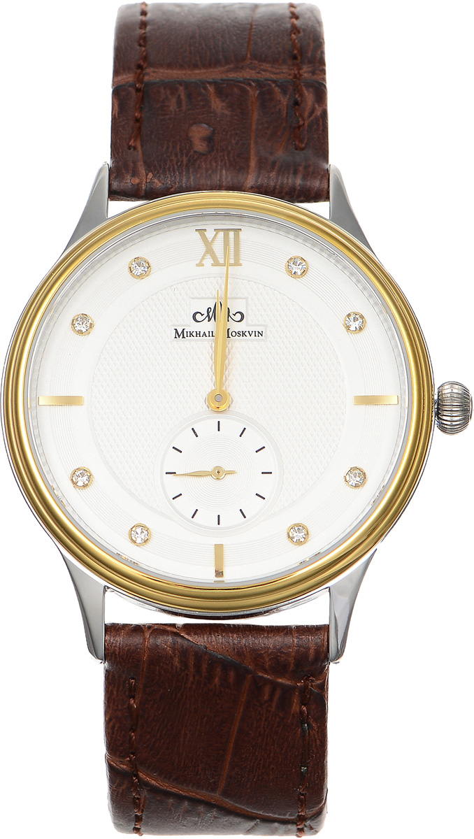 Часы наручные мужские Mikhail Moskvin Elegance, цвет: коричневый, золотой. G5002S4L3G5002S4L3 Часы наручные мужские Mikhail Moskvin Elegance, цвет: коричневый, золотой. G5002S4L3G5002S4L3Стильные мужские наручные часы сдержанного классического дизайна Mikhail Moskvin из серии Elegance изготовлены из высокотехнологичной гипоаллергенной нержавеющей стали и натуральной кожи. Модель органично сочетает в себе технологичность и строгость, оформлена символикой бренда и стразами. Для того чтобы защитить циферблат от повреждений в часах используется высокопрочное сапфировое стекло. Циферблат изделия оснащен часовой и минутной стрелками, а также украшен шкалой секундной стрелки, вынесенной к цифре 6 и чередующимися отметками. Корпус часов оснащен кварцевым японским механизмом, степенью влагозащиты равной 3 Bar. Браслет комплектуется надежной и удобной в использовании застежкой-пряжкой, которая позволит с легкостью снимать и надевать часы, а также регулировать длину браслета. Часы упакованы в фирменную коробку и дополнительно в текстильную сумку с названием бренда. Часы Mikhail Moskvin подчеркнут мужской характер и отменное чувство стиля их обладателя.