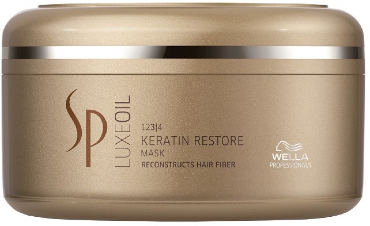 Wella SP Маска для восстановления кератина волос Luxe Line, 150 мл612849 Wella SP Маска для восстановления кератина волос Luxe Line, 150 мл612849Wella SP Luxe Line Маска для восстановления кератина волос - интенсивно ухаживает за вашими волосами, легко восстанавливает структуру каждого вашего волоска, не пропуская не одного. Придает волосам необходимый оббьем, не отягощая при этом их, равномерно ложиться на волосы. Маска придает волосам ослепительный блеск, мягкость и безупречную шелковистость. Питает волосы, защищает от повреждений и сечения, создавая не видимую защиту на поверхности волос. В состав маски для восстановления кератина, входят ценные масла: миндаля питает волосы и бережно следит за кожей головы, стимулирует рост уставших волос. Жожоба и арганы насыщают волосы витаминами E и F, помогают избежать сечению и повреждению волос. Кератин, является самым главным в составе маски, который восстанавливает волос изнутри и конструирует структуру вашего волоса.