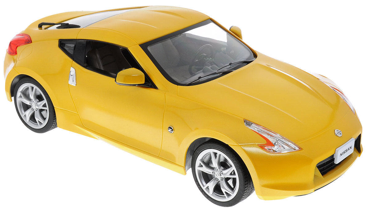 Rastar Радиоуправляемая модель Nissan 370Z цвет желтый38700 Rastar Радиоуправляемая модель Nissan 370Z цвет желтый38700Радиоуправляемая модель Rastar Nissan 370Z - яркая реалистичная модель автомобиля в масштабе 1:14! Игрушка выполнена из безопасного пластика. Колеса машинки прорезинены, что обеспечивает плавный ход, игрушка не портит напольное покрытие. Управление машинкой происходит с помощью пульта. Движение автомобиля: вперед-назад, поворот направо, поворот налево, стоп. Автомобиль обладает световыми эффектами. Радиоуправляемые игрушки способствуют развитию координации движений, моторики и ловкости. Ваш ребенок часами будет играть с машиной, придумывая различные истории и устраивая соревнования. Машина работает от 5 батареек типа АА (не входят в комплект). Пульт управления работает от батарейки 9V типа Крона (не входит в комплект).