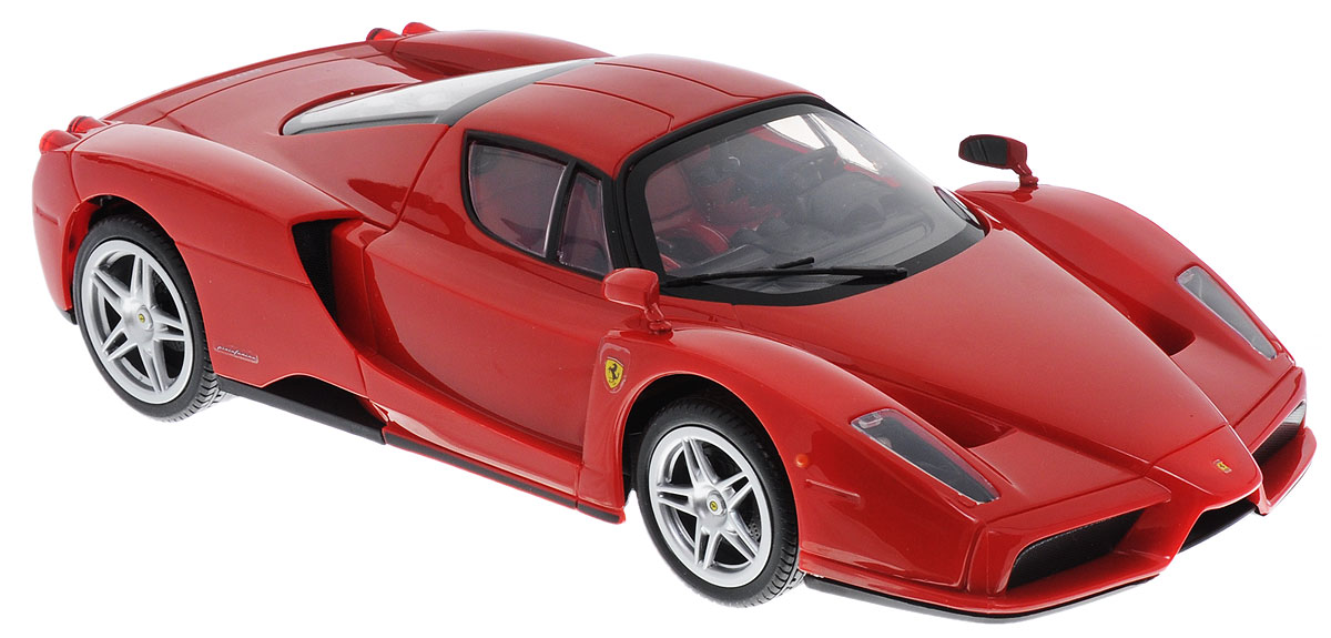 Silverlit Радиоуправляемая модель Ferrari Enzo86027C Silverlit Радиоуправляемая модель Ferrari Enzo86027CТеперь мечта юного гонщика стала еще ближе! Гоночная радиоуправляемая модель Silverlit Ferrari Enzo выполнена с высокой детализацией по лицензии Ferrari в масштабе 1:16. Управлять машинкой нужно с помощью пульта, который невероятно облегчает способ команды выполнения различных трюков и набора скорости. Ferrari очень маневренная и скоростная, а в сумрачное время горящие фары сделают игру еще увлекательней. Движения автомобиля: вперед-назад, влево-вправо, остановка. Пульт управления работает на частоте 27 MHz. Радиоуправляемые игрушки способствуют развитию координации движений, моторики и ловкости. Ваш ребенок часами будет играть с моделью, придумывая различные истории и устраивая соревнования. Порадуйте его таким замечательным подарком! Машина работает от 4 батареек типа АА (входят в комплект). Пульт управления работает от батарейки типа Крона (входит в комплект).