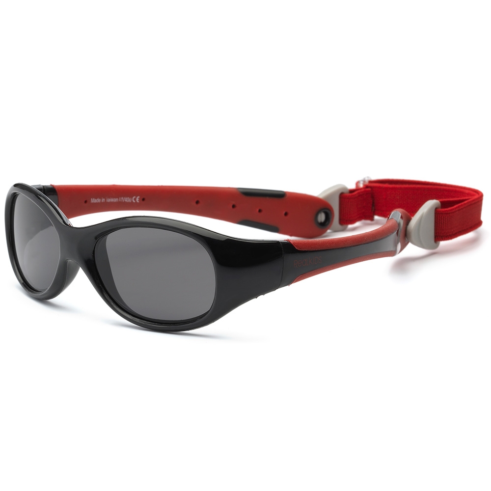 Real Kids Shades Очки солнцезащитные детские от 0 месяцев цвет черный красный0EXPBKRD Real Kids Shades Очки солнцезащитные детские от 0 месяцев цвет черный красный0EXPBKRDБезопасные солнцезащитные очки для детей с рождения Real Kids Shades 0+ 100% защита детских глаз от ультрафиолетовых лучей (UVA и UVB). Гибкая оправа Flex FitТМ, с дужками обтекаемой формы снижает до минимума риск повреждений детских глаз при одевании. Очки не сломаются, если ребенок случайно сядет на них, или потянет дужки в разные стороны Форма очков минимизирует воздействие периферийного света. Ударопрочные, травмобезопасные поликарбонатные линзы. Регулируемый, эластичный, съемный ремешок в комплекте. Очки хорошо держатся и не создают неудобств ребенку. Дети в очках Реал Кидс могут даже спать. Созданы с учетом подвижного образа жизни ребенка, Отдельное внимание уделено тому, чтобы очки хорошо сидели. Малыши могут кататься на качелях, висеть вверх ногами, плавать и играть без боязни того, что очки слетят в самый неподходящий момент. Безопасность: не содержат свинец, бисфенол-А, фталаты. Соответствуют всем международным нормам безопасности EC, Австралии, Америки, России.