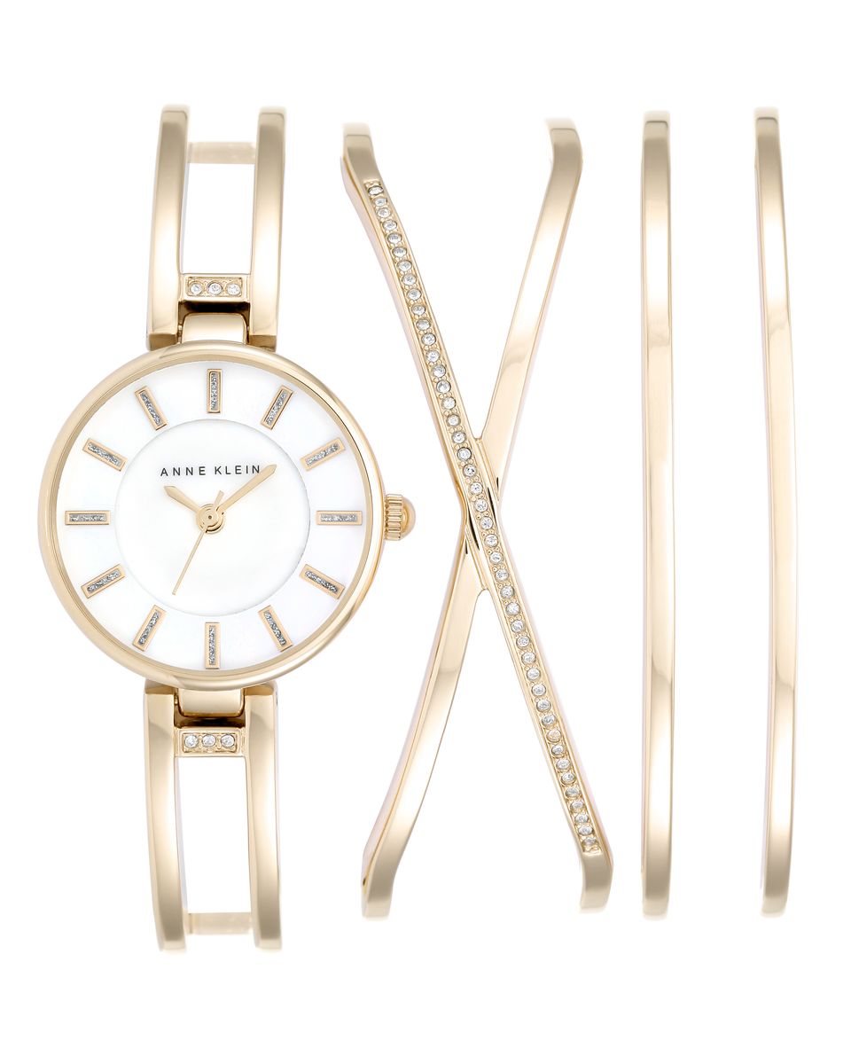 Наручные часы женские Anne Klein Ring, цвет: золотистый. 2236 GBST2236 GBST Наручные часы женские Anne Klein Ring, цвет: золотистый. 2236 GBST2236 GBSTКорпус 26 мм, циферблат- натуральный перламутр белого цвета, инкрустация кристаллами Swarovski, 3 дополнительных браслета, золотистое покрытие металла, водозащита 3 АТМ