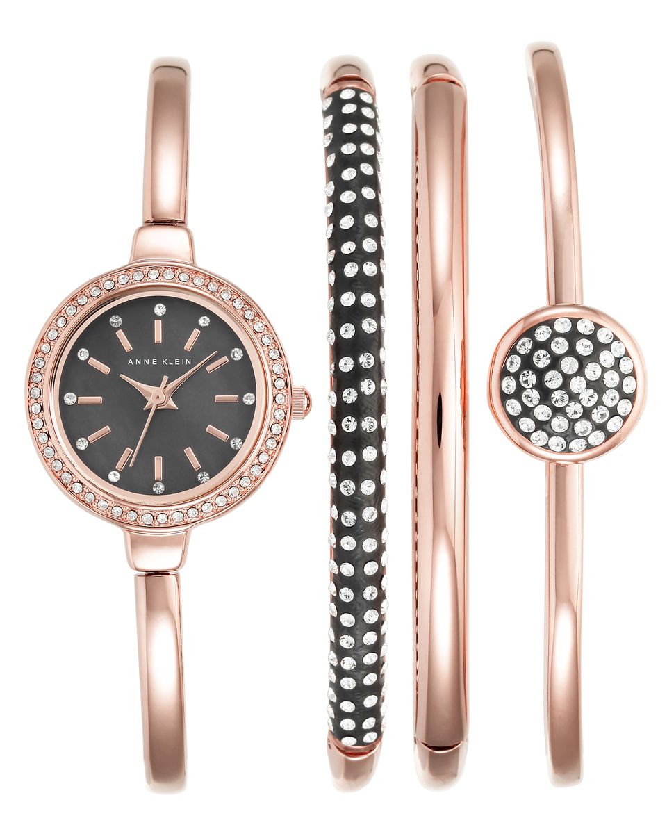 Наручные часы женские Anne Klein Ring, цвет: бледно-розовый. 2240 RGST2240 RGST Наручные часы женские Anne Klein Ring, цвет: бледно-розовый. 2240 RGST2240 RGSTКорпус 24 мм, циферблат- натуралный перламутр черного цвета, 3 дополнительных браслета с использованием металла с покрытием розового цвета, безель и браслеты инкрустированы кристаллами Swarovski, водозащита 3 АТМ
