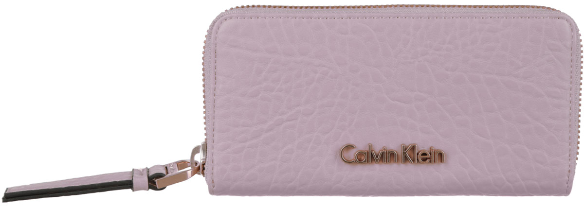Кошелек женский Calvin Klein Jeans, цвет: бежевый. K60K600999_0120K60K600999_0120 Кошелек женский Calvin Klein Jeans, цвет: бежевый. K60K600999_0120K60K600999_0120Элегантный кошелек Calvin Klein выполнен из искусственной кожи с декоративным фактурным тиснением и оформлен металлической фурнитурой. Изделие закрывается на застежку-молнию. Внутри кошелька расположены два отделения для купюр, отделение для мелочи на молнии, два потайных кармашка и восемь карманов для пластиковых карт. Изделие поставляется фирменной упаковке. Практичный аксессуар прекрасно дополнит ваш образ.