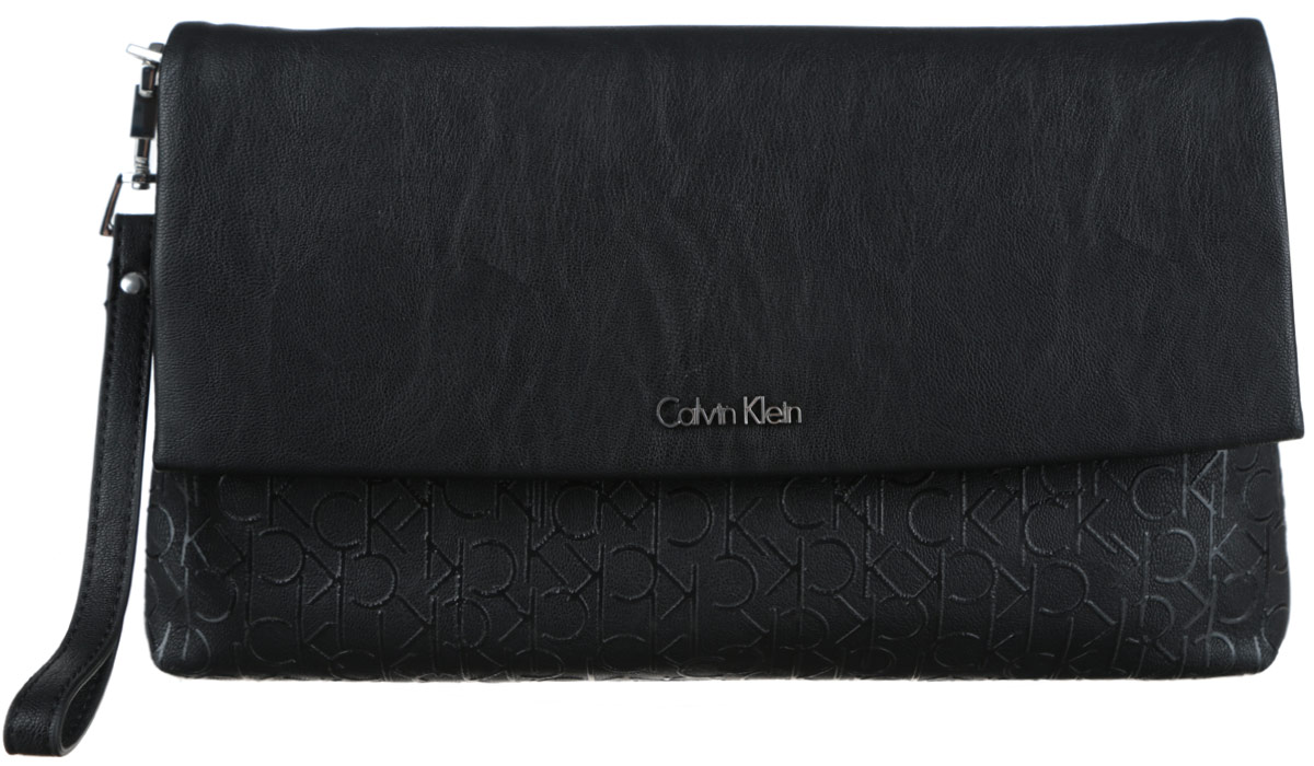 Клатч женский Calvin Klein Jeans, цвет: черный. K60K601128_0010K60K601128_0010 Клатч женский Calvin Klein Jeans, цвет: черный. K60K601128_0010K60K601128_0010Стильный женский клатч Calvin Klein Jeans выполнен из полиуретана. Изделие имеет одно основное отделение, которое закрывается на клапан с магнитной кнопкой. Внутри находятся прорезной карман на застежке-молнии и два накладных открытых кармана. Модель оснащена съемным ремешком на запястье. Стильный клатч внесет элегантные нотки в ваш образ и подчеркнет ваше отменное чувство стиля.