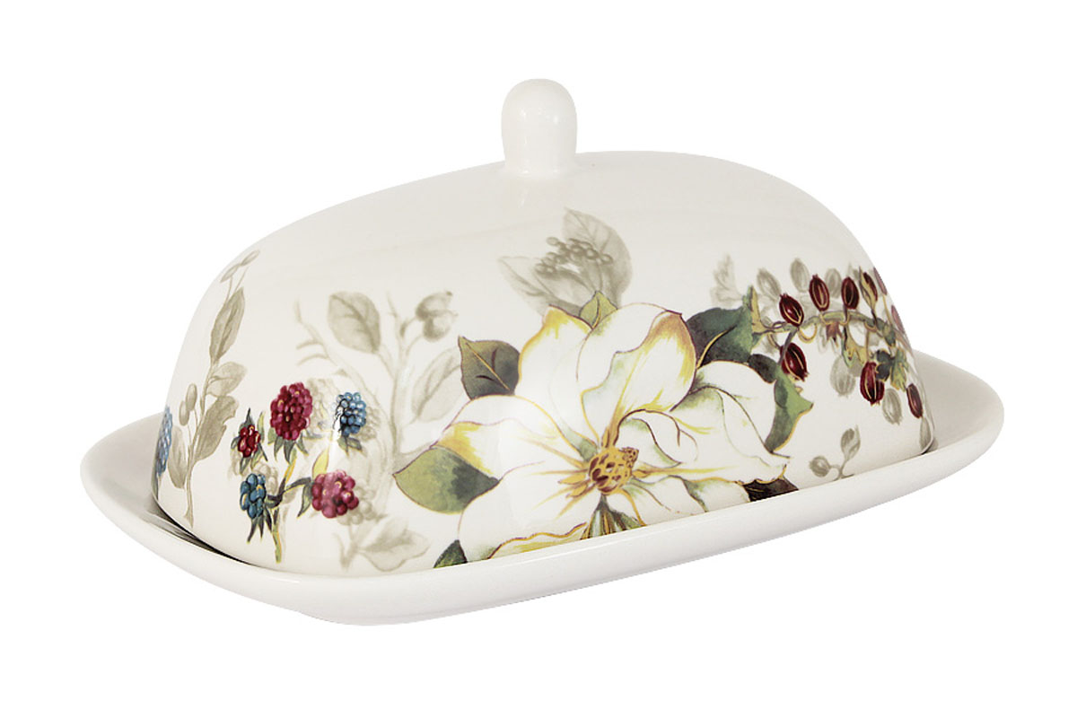 Масленка Imari Магнолия, цвет: белый, зеленый, желтыйIMB0360-A2119AL Масленка Imari Магнолия, цвет: белый, зеленый, желтыйIMB0360-A2119ALВеликолепная масленка Imari Магнолия, выполненная из высококачественной керамики, предназначена для красивой сервировки и хранения масла. Она состоит из подноса и крышки. Масло в ней долго остается свежим, а при хранении в холодильнике не впитывает посторонние запахи. Масленка Imari Магнолия идеально подойдет для сервировки стола и станет отличным подарком к любому празднику. Можно мыть в посудомоечной машине. Не использовать в микроволновой печи. Размеры: 18,5 х 12,5 см.