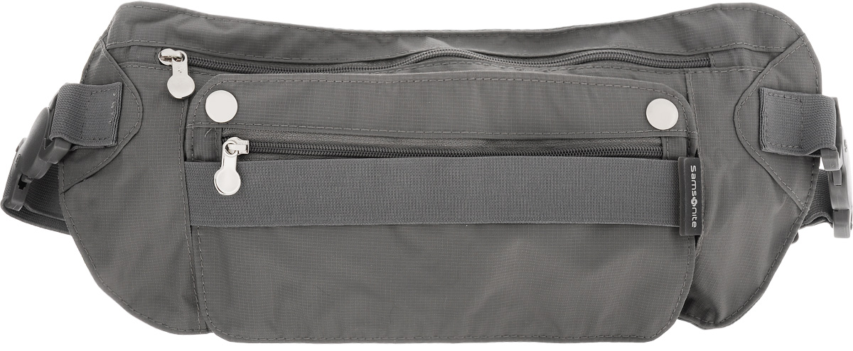 Сумка поясная SamsoniteU23-18510 Сумка поясная SamsoniteU23-18510Компактная поясная сумка Samsonite, выполненная из высококачественного, нейлона отлично подойдет для переноски самого необходимого. Сумка содержит одно вместительное отделение, закрывающееся на застежку-молнию. Лицевая сторона изделия дополнена съемным карманом. Эластичный поясной ремень фиксируется при помощи пластиковой пряжки. Длина ремня регулируется. Максимальный обхват поясного ремня составляет 114 см. Размер сумки: 31 х 14,5 см.