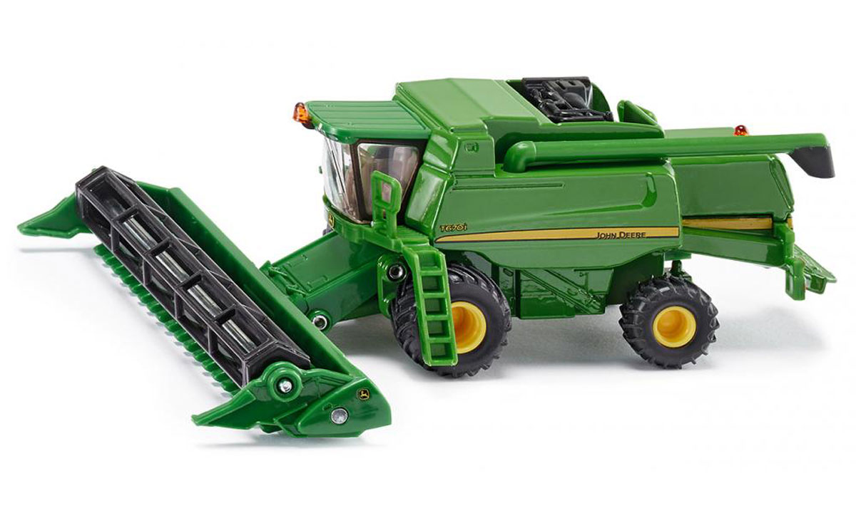 Siku Комбайн John Deere T670i1876 Siku Комбайн John Deere T670i1876Модель комбайна John Deere T670i Siku выполнена в виде точной копии настоящего комбайна в масштабе 1:87. Такая модель понравится не только ребенку, но и взрослому коллекционеру, и приятно удивит вас высочайшим качеством исполнения. Комбайн имеет металлический корпус и прозрачные пластиковые вставки, имитирующие стекла. Колеса комбайна выполнены из резины и имеют свободный ход. Модель станет не только интересной игрушкой для ребенка, интересующегося агротехникой, но и займет достойное место в коллекции.