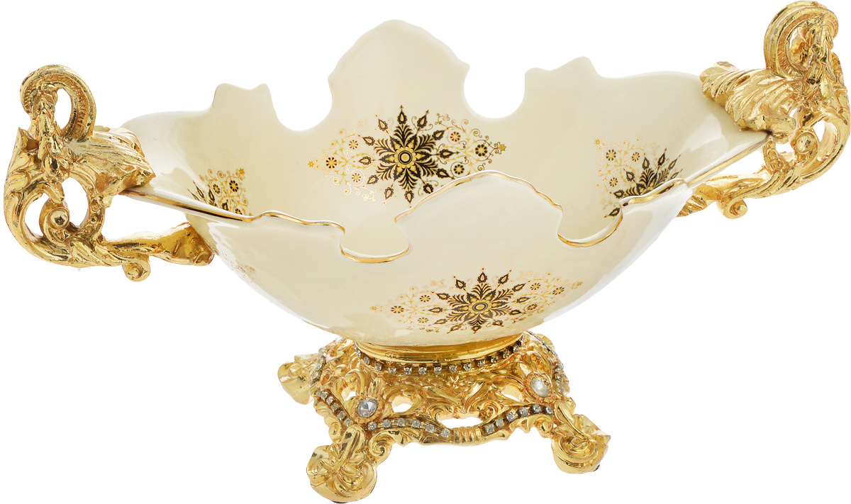 Фруктовница Patricia Конкордия, 33 х 16 смIM10-0206 Фруктовница Patricia Конкордия, 33 х 16 смIM10-0206Оригинальная фруктовница Patricia Конкордия, изготовленная из высококачественного фарфора, имеет фиксированную подставку из полистоуна, оснащенную изящными ножками с противоскользящими накладками. Подставка, декорированная стразами, имеет изысканный внешний вид. Изделие подойдет для подачи фруктов или сладостей. Стильная форма и интересное исполнение идеально впишутся в любой стиль. Не рекомендуется использовать в микроволновой печи и мыть в посудомоечной машине. Размер фруктовницы (по верхнему краю): 33 х 16 см. Высота фруктовницы: 17 см.