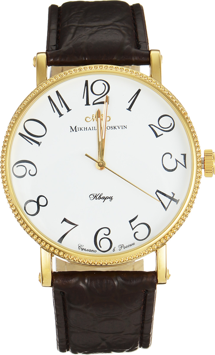Часы наручные мужские Mikhail Moskvin, цвет: золотой, коричневый. 1128A2L21128A2L2 Часы наручные мужские Mikhail Moskvin, цвет: золотой, коричневый. 1128A2L21128A2L2Стильные мужские наручные часы Mikhail Moskvin сочетают в себе элегантность и надёжность. Часы изготовлены из высокотехнологичной гипоаллергенной нержавеющей стали и дополнены ремешком из искусственной кожи. Ремешок выполнен под кожу крокодила и оформлен тиснением логотипа бренда с обратной стороны. Для того чтобы защитить циферблат от повреждений в часах используется высокопрочное минеральное стекло сферической формы. Корпус укомплектован надежным, высокоточным японским кварцевым механизмом, производства фирмы Seiko Epson и обладает степенью влагозащиты равной 3 Bar. Тонкий ободок корпуса имеет рифленую поверхность. Изящные скругленные уши, фиксирующие ремень, дополнены с боков винтами. Черные арабские цифры на белом поле циферблата придают часам стильность и отлично гармонируют с тонкими стрелками. Браслет комплектуется надежной и удобной в использовании застежкой-пряжкой, которая позволит с легкостью снимать и надевать часы, а также регулировать длину браслета. Часы...