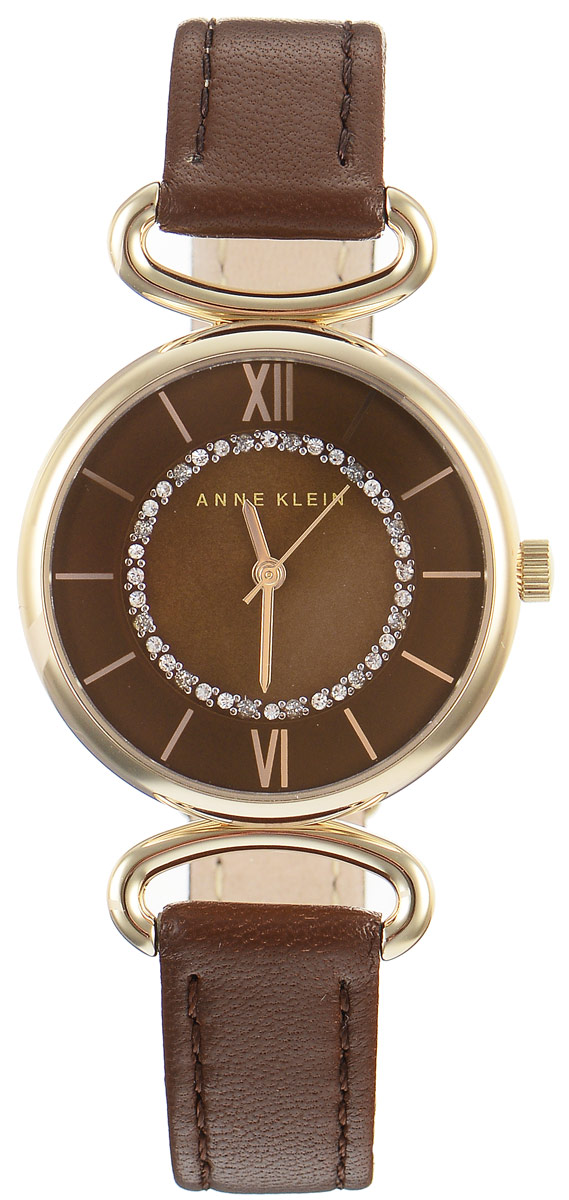 Часы наручные женские Anne Klein Ring, цвет: коричневый, золотой. 19321932 BMBN Часы наручные женские Anne Klein Ring, цвет: коричневый, золотой. 19321932 BMBNЭлегантные женские часы Anne Klein Ring выполнены из металлического сплава, оформлены чешскими кристаллами и символикой бренда. Циферблат украшен вставкой из натурального перламутра. Лаконичный корпус надежно защищен устойчивым к царапинам минеральным стеклом, а также имеет степень влагозащиты 3 Bar. Часы оснащены кварцевым механизмом, дополнены изящным ремешком из натуральной кожи. Ремешок застегивается на практичную пряжку. Часы поставляются в фирменной упаковке. Часы Anne Klein Ring подчеркнут изящество женской руки и отменное чувство стиля у их обладательницы.