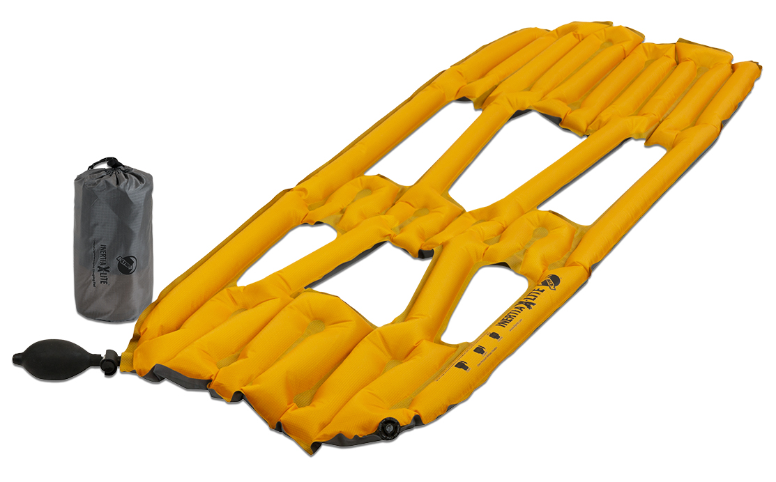 Надувной коврик Klymit Inertia X-Lite pad Orange, цвет: оранжевый06ILOr01A Надувной коврик Klymit Inertia X-Lite pad Orange, цвет: оранжевый06ILOr01ACамый легкий и компактный туристический коврик! 3/4 длины стандартного коврика. Технология loft pocket (сохранение тепла и улучшенная воздухопроницаемость за счет пустот и сварных швов) Технология body mapping (комфорт за счет учета ключевых точек давления тела на коврик) 3- х сезонный - Материал – полиэстер 75D –низ; 30 D- верх - Надувается за 2- 4 выдоха - Размер – 107 см x 46 см x 4 см ; в сложенном виде - 6.4 см x 14 см - Вес – 173 гр. - В комплекте – коврик с 2- мя клапанами (1 для насоса; другой – для спуска во время лежания), насос, набор для ремонта (патч и клей),чехол - Цвет - Оранжевый