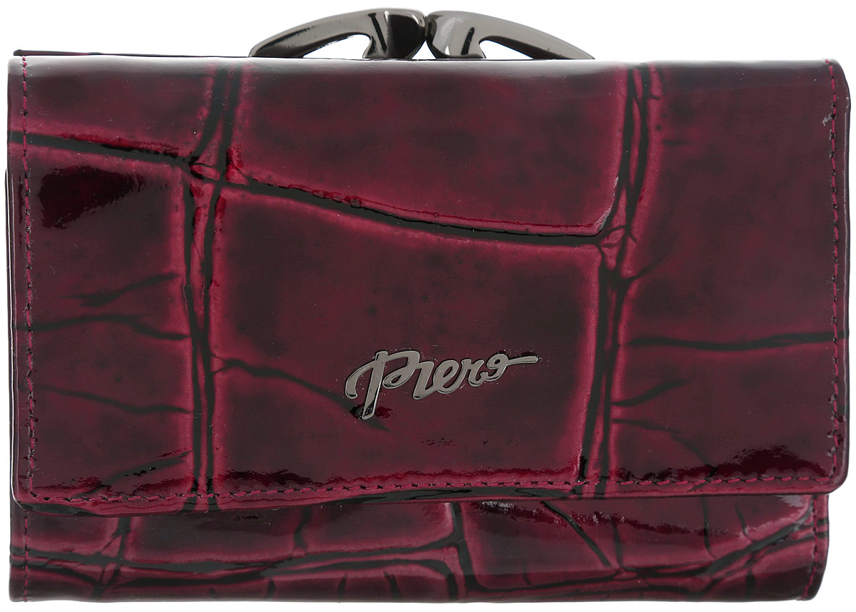 Кошелек женский Piero, цвет: рубиновый. 42М2_90095_21_П_2242М2_90095_21_П_22 Кошелек женский Piero, цвет: рубиновый. 42М2_90095_21_П_2242М2_90095_21_П_22Небольшой стильный женский кошелек Piero изготовлен из натуральной лаковой кожи с тиснением под рептилию. Внутри находятся три отделения для купюр, одно из которых на молнии. Также имеются два боковых кармана и карман с прозрачным окошком, три кармана для визиток и карт. На тыльной стороне расположено специальное отделение с рамочным замком для мелочи. Кошелек закрывается клапаном на кнопку. Кошелек упакован в плотную коробку с логотипом фирмы. Такой функциональный аксессуар станет замечательным подарком человеку, ценящему качественные и практичные вещи.