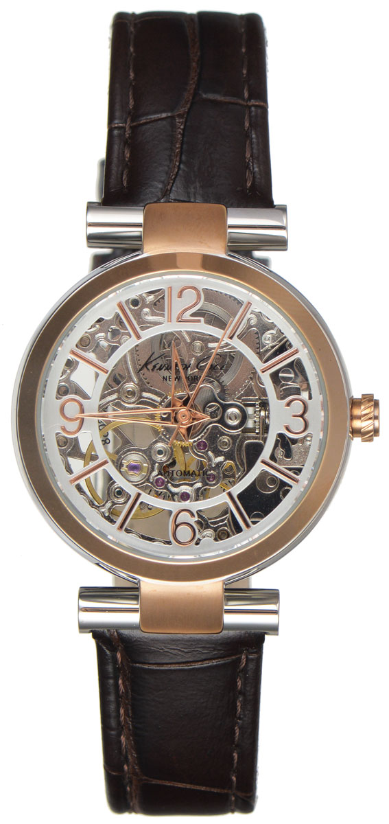 Часы наручные женские Kenneth Cole, цвет: коричневый. IKC2819IKC2819 Часы наручные женские Kenneth Cole, цвет: коричневый. IKC2819IKC2819Женские механические скелетонизированные часы Kenneth Cole изготовлены из материалов самого высокого качества на базе новейших технологий. Циферблат оформлен символикой бренда. Корпус часов изготовлен из нержавеющей стали с PVD-покрытием и имеет степень влагозащиты, равную 5 Bar, оснащен механическим механизмом, а также устойчивым к царапинам минеральным стеклом. Задняя крышка дополнена стеклянной вставкой, благодаря чему видно элементы механизма. Ремешок, выполненный из натуральной кожи с тиснением под крокодила, оснащен классической застежкой. Часы поставляются в фирменной упаковке. Часы Kenneth Cole для любителей оригинальных, неординарных аксессуаров, подчеркнут отменное чувство стиля их обладателя.