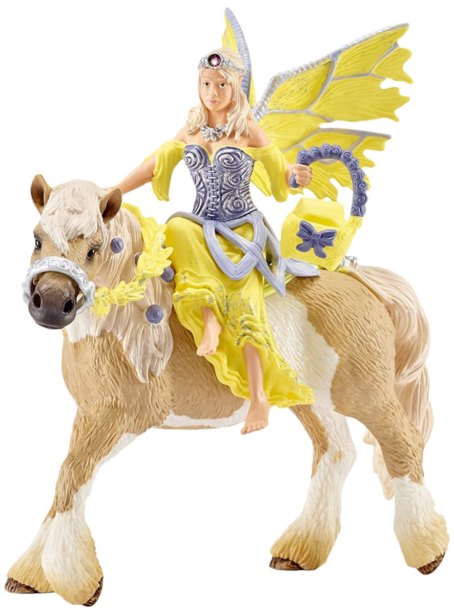 Schleich Фигурка Эльфийка Сера на лошади70503 Schleich Фигурка Эльфийка Сера на лошади70503Фигурка Schleich Эльфийка Сера разнообразит сюжетно-ролевые фантастические игры вашего ребенка и станет прекрасным пополнением коллекции эльфов от Schleich. У эльфийки есть волшебные крылышки, которые переливаются на солнце и с помощью которых она легко перелетает с места на место. Она любит скакать верхом на лошади по зеленым лугам и петь песни. Никто из эльфов не знает столько всего о растениях и животных, сколько знает Сера. Сегодня она торопится на фестиваль Эльфов в красивом платье, на котором она будет петь восхитительную песню. Прекрасно выполненная фигурка отличается высочайшим качеством игрушек ручной работы. Фигурка разработана с учетом исследований в области педагогики. Фигурка эльфа надежно держится на лошадке благодаря встроенному магниту. Сюжетно-ролевые игры с фигурками развивают фантазию и воображение ребенка.