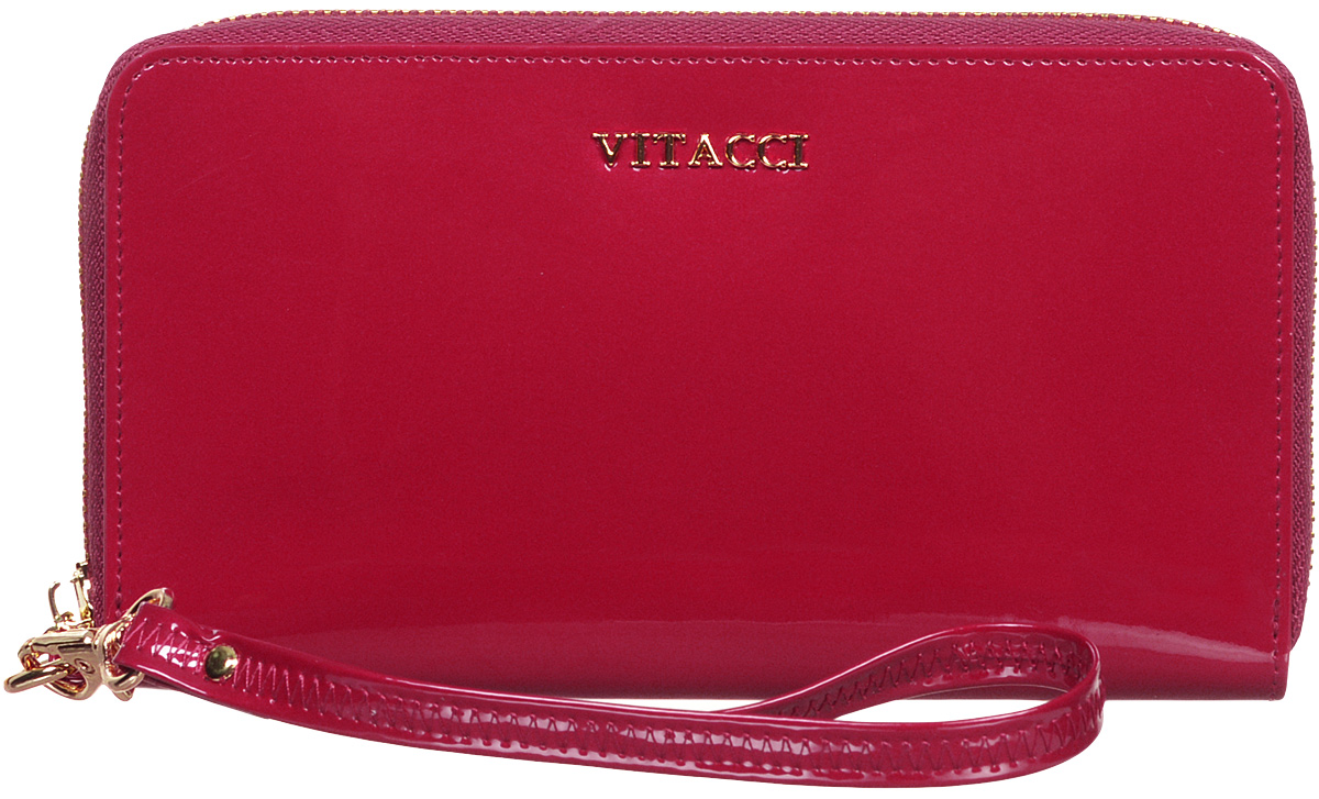 Кошелек женский Vitacci, цвет: красный. HS019HS019 Кошелек женский Vitacci, цвет: красный. HS019HS019Модный женский кошелек Vitacci выполнен из натуральной лаковой кожи. Модель закрывается на застежку-молнию. Внутри 3 отделения для купюр, отделение для мелочи на застежке-молнии и 6 длинных карманов. Изделие дополнено съемным кожаным ремешком с замком-карабином. Такой кошелек станет прекрасным стильным подарком для любителей респектабельных аксессуаров и порадует простотой и функциональностью. Изделие упаковано в фирменную коробку.