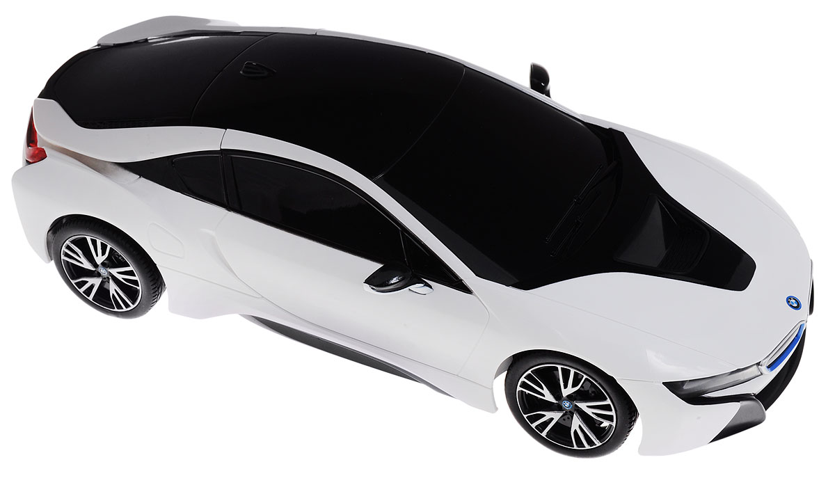 Rastar Радиоуправляемая модель BMW i8 цвет белый черный масштаб 1:1859200 Rastar Радиоуправляемая модель BMW i8 цвет белый черный масштаб 1:1859200Радиоуправляемая модель Rastar BMW i8 - отличный подарок для вашего мальчика! Предназначена для всех, кто любит роскошь и высокие скорости. Автомобиль обладает неповторимым провокационным стилем и спортивным характером. Потрясающая маневренность, динамика и покладистость - отличительные качества этой модели. Возможные движения: вперед, назад, вправо, влево. Имеются световые эффекты. Пульт управления работает на частоте 27 MHz. Радиоуправляемые игрушки способствуют развитию координации движений, моторики и ловкости. Ваш ребенок часами будет играть с моделью, придумывая различные истории и устраивая соревнования. Порадуйте его таким замечательным подарком! Для работы машины необходимо купить 4 батарейки напряжением 1,5V типа АА (не входят в комплект). Для работы пульта управления необходимы 2 батарейки напряжением 1,5V типа АА (не входят в комплект).