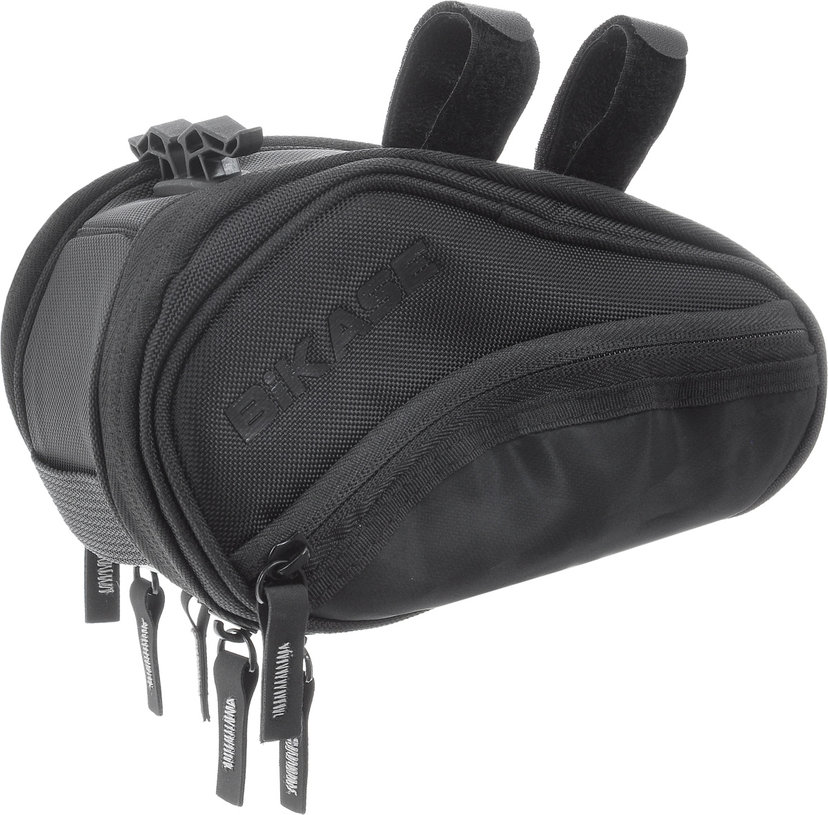 Велосумка под седло BiKase Wing Seat Pack, 11 х 10 х 21 смPN1032 Велосумка под седло BiKase Wing Seat Pack, 11 х 10 х 21 смPN1032Велосумка BiKase Wing Seat Pack выполнена из высококачественных материалов. Изделие крепится под седло велосипеда при помощи 2 ремней с липучками и универсального T-bar крепления. Сумка оснащена двумя внешними прозрачными карманами из тефлона и светоотражающими вставками. Модель имеет два отделения, которые закрываются на застежки-молнии. Внутри расположены сетчатые карманы.