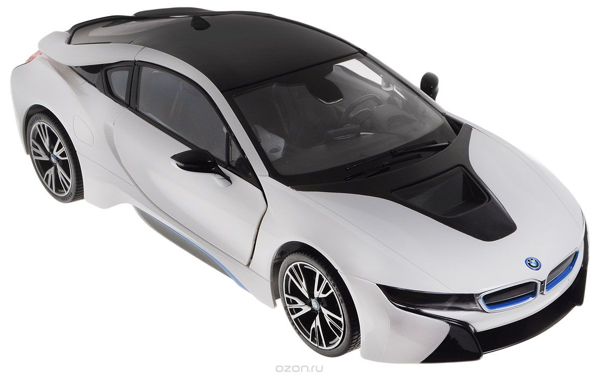 Rastar Радиоуправляемая модель BMW i8 цвет белый черный масштаб 1:1471000 Rastar Радиоуправляемая модель BMW i8 цвет белый черный масштаб 1:1471000Радиоуправляемая модель Rastar BMW i8 станет отличным подарком любому мальчику! Все дети хотят иметь в наборе своих игрушек ослепительные, невероятные и крутые автомобили на радиоуправлении. Тем более, если это автомобиль известной марки с проработкой всех деталей, удивляющий приятным качеством и видом. Одной из таких моделей является автомобиль на радиоуправлении Rastar BMW I8. Это точная копия настоящего авто в масштабе 1:14. Авто обладает неповторимым провокационным стилем и спортивным характером. Потрясающая маневренность, динамика и покладистость - отличительные качества этой модели. Корпус автомобиля выполнен из металла с использованием пластиковых элементов. Возможные движения: вперед, назад, вправо, влево, остановка. Колеса игрушки прорезинены и обеспечивают плавный ход, машинка не портит напольное покрытие. Имеются световые эффекты, а также открывание дверей происходит дистанционно с пульта управления. Пульт управления работает на...