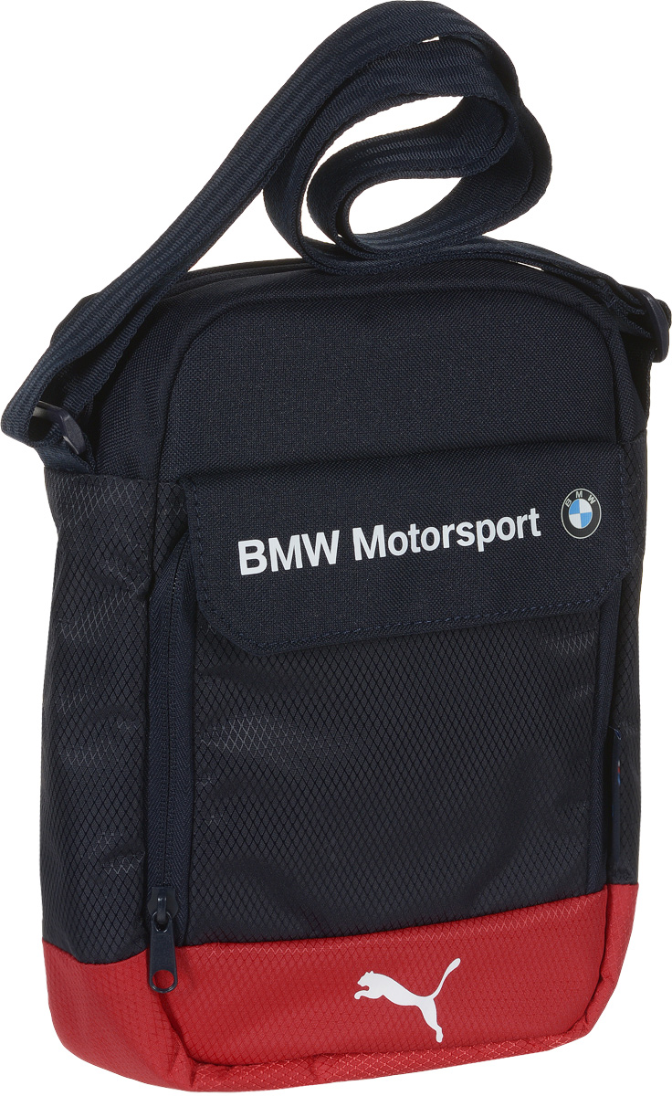 Сумка Puma BMW Motorsport Portable, цвет: синий. 0742710207427102 Сумка Puma BMW Motorsport Portable, цвет: синий. 0742710207427102Сумка от Puma линии BMW Motorsport Portable имеет главное отделение на молнии, внутреннее отделение с мягкой подкладкой для надежной защиты помещаемых в него электронных устройств (планшетов, смартфонов и пр.), отделение спереди на молнии под клапаном на «липучке», внутренние накладные карманы, функциональную подкладку из полиэстера с изнанкой из полиуретана и лямку через плечо регулируемой длины из лямочной ленты. Сумка украшена пластиковой фурнитурой Duraflex. Декоративные элементы также представлены яркими прорезиненными шнурами, продернутыми сквозь язычки застежек-молний, набивной надписью BMW и набивной эмблемой BMW спереди, тканым ярлыком сбоку с текстом powered by M и набивным логотипом Puma спереди. Основанный в 1948 году бренд Puma стал выбором многих героев мирового спорта. Дизайн Puma сосредоточен на стиле и функциональности моделей, поэтому коллекции брендовой одежды и обуви сочетают современный стиль с инновационными спортивными технологиями