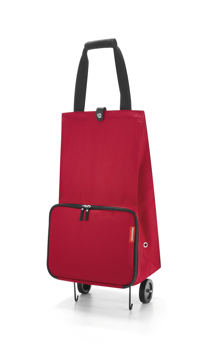 Сумка на колесиках женская Reisenthel Foldabletrolley red, цвет: красный. HK3004HK3004 Сумка на колесиках женская Reisenthel Foldabletrolley red, цвет: красный. HK3004HK3004Отличное решение для тех, кто не любит таскать тяжелые сумки и пакеты. С такой сумкой хоть в магазин, хоть на Северный полюс. Главный ее плюс в том, что она складывается до супер-компактного размера, так что ее легко хранить и брать с собой. Размер в сложенном виде: 6,5 х 25 х 32,5 см. Объем - 30 литров. Главное отделение застегивается на кнопку. Ручки удобно соединяются между собой с помощью липучки. Кромки днища специально укреплены и защищены, а само оно устойчиво, так что сумка не падает и не кренится.