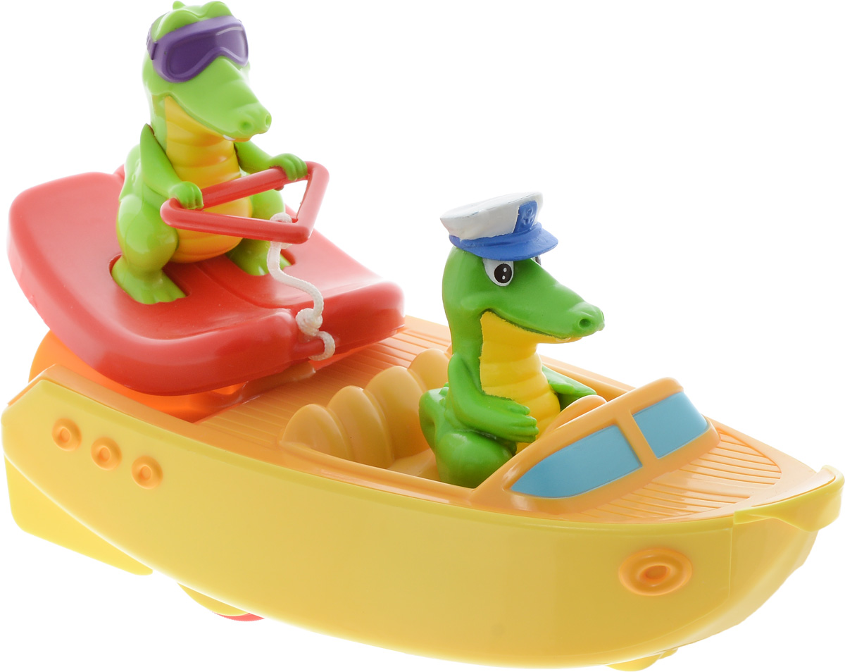 Tomy Игрушка для ванной Крокодил на лодкеE72358 Tomy Игрушка для ванной Крокодил на лодкеE72358Прокати забавных крокодильчиков по волнам! Игрушка состоит из лодочки, в которой сидит крокодильчик-капитан, и крокодильчика-спортсмена на водных лыжах. Когда малыш вытянет фигурку крокодильчика на водных лыжах, который соединен с катером при помощи тонкого троса, моторчик на задней части лодочки заведётся, и катер отправится в плавание! При движении крокодильчик на лыжах потихоньку приближается к лодке, и, догнав её, оказывается в исходном положении. У катера также есть колёсики: малыш может возить лодочку по любой ровной поверхности.