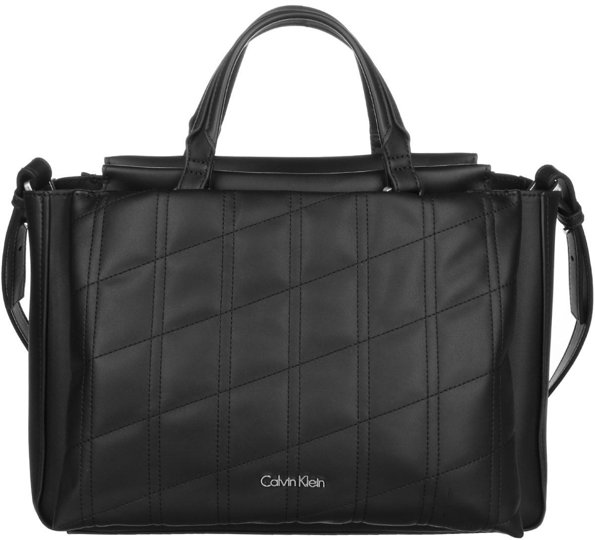 Сумка женская Calvin Klein Jeans, цвет: черный. K60K602088_0010K60K602088_0010 Сумка женская Calvin Klein Jeans, цвет: черный. K60K602088_0010K60K602088_0010Стильная сумка Calvin Klein Jeans выполнена из полиуретана. Изделие содержит одно большое отделение, которое закрывается на застежку-молнию. Внутри сумки размещен один накладной карман на застежке-молнии. Сумка оснащена плечевым ремнем регулируемой длины. Снаружи спереди и сзади сумка оснащена большими накладными карманами на магнитных замках. Оформлена модель металлической пластиной с названием бренда и небольшим брелоком. В комплекте с изделием поставляется чехол для хранения.