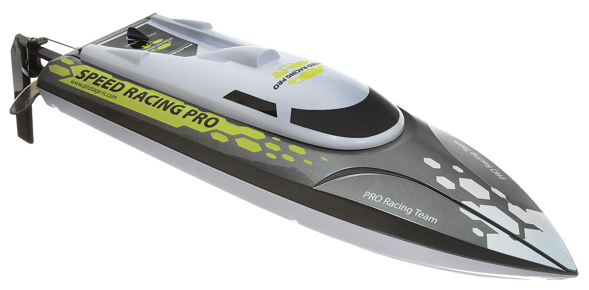 Pilotage Катер на радиоуправлении Speed Racing Pro RTR цвет серый металлик желтыйRC18171 Pilotage Катер на радиоуправлении Speed Racing Pro RTR цвет серый металлик желтыйRC18171Катер на радиоуправлении Pilotage Speed Racing Pro RTR с коллекторным электродвигателем и современной помехозащищенной радиоаппаратурой приведет в восторг любого мальчишку. Этот скоростной радиоуправляемый катер - источник адреналина, модель разгоняется до скорости 40 км/ч! Прочный V-образный корпус имеет функцию антиопрокидывания - даже если ваша модель, проходя поворот на высокой скорости перевернется, вам не придется ее доставать из воды. Катер имеет функцию обратного переворота в нормальное положение. Вы сможете быстро продолжить гонку! Небольшой катер комплектуется мощным электромотором типа 390, который ставят на больших катерах. Водяное охлаждение двигателя позволяет длительное время носиться на максимальной скорости, не боясь перегрева. Сигнализация о низком напряжении батареи подскажет вам, когда необходимо закончить заезд, чтобы пригнать катер к берегу. Катер комплектуется современной радиоаппаратурой, которая гарантирует пропорциональное управление на расстоянии...