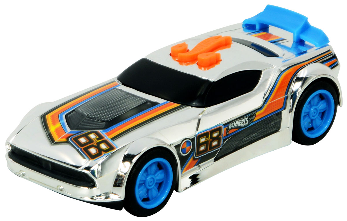 Hot Wheels Машинка Fast FishHW90602 Hot Wheels Машинка Fast FishHW90602Яркая и стильная скоростная машинка со звуковыми и световыми эффектами из серии Edge Glow Cruisers порадует самого взыскательного любителя игрушечных гоночных авто. Она оснащена потрясающе реалистичными звуками рычащего мотора и свиста колес и элементами корпуса, святящимися неоновым светом! Машинка Hot Wheels Fast Fish выполнена в серебристом цвете, украшена номером участника гонки, на крыше багажника установлен небольшой ярко-голубой спойлер. Диски колес также ярко-голубые. Машинка изготовлена из высококачественного пластика. Игрушка имеет как игровую, так и коллекционную ценность. Рекомендуется докупить 3 батарейки напряжением 1,5V типа LR44/AG13 (товар комплектуется демонстрационными).