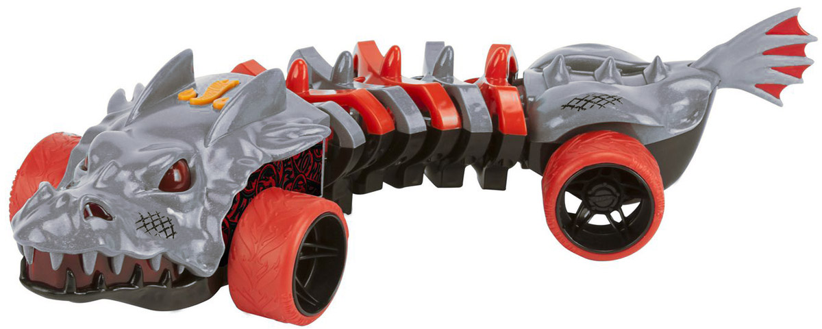 Hot Wheels Машинка SkullfaceHW90732 Hot Wheels Машинка SkullfaceHW90732Необычного вида машинка Hot Wheels Skullface из новой серии Mutant Machines, двигающаяся по виляющей траектории - отличный подарок для каждого любителя игрушечных авто. Автомобиль выполнен в ярком агрессивном дизайне, стилизованном под фантастического дракона, цветовая гамма сочетает серый и красный цвета. При движении игрушка издает звуковые эффекты. Машинка является электромеханической - работает от батареек, запускается в движение при помощи кнопки, расположенной в верхней части корпуса, оснащена звуковыми и световыми эффектами. Рекомендуется докупить 3 батарейки напряжением 1,5V типа ААА/LR03 (товар комплектуется демонстрационными).