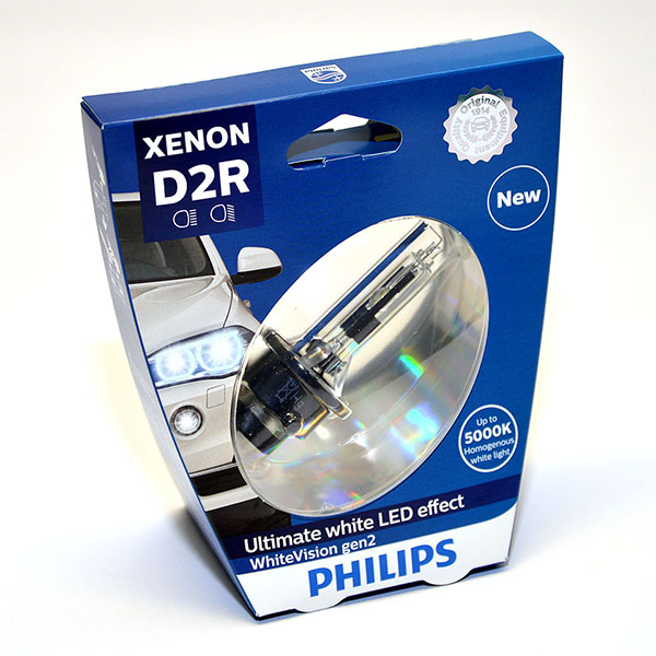 Лампа автомобильная ксеноновая Philips WhiteVision gen2, цоколь D2R, 85 Вт. 85126 WHV2S185126 WHV2S1 Лампа автомобильная ксеноновая Philips WhiteVision gen2, цоколь D2R, 85 Вт. 85126 WHV2S185126 WHV2S1? Мощный равномерный яркий белый свет ? Идеально сочетается со светодиодным освещением вашей машины ? Белый свет до 5000K на дороге ? Улучшение видимости на 120%* ? Лампа, разрешенная для использования на дорогах общего пользования С лампами Philips Xenon WhiteVision gen2 машина становится более заметной, а освещение дороги более ярким и равномерным. Xenon WhiteVision gen2 — идеальный выбор, если вы хотите сочетать ксенон со светодиодным освещением автомобиля.