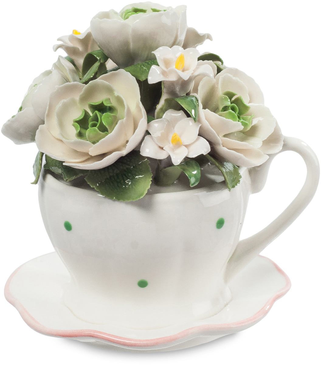 Музыкальная композиция Pavone Чашка с цветами. CMS-33/71CMS-33/71 Музыкальная композиция Pavone Чашка с цветами. CMS-33/71CMS-33/71Музыкальная композиция Чашка с цветами (Pavone) Почему считается, что цветы в вазе должны быть на длинных ножках? Мода такая, что ли? Да, это красиво, но не значит, что коротко срезанные цветы на маленьких стебельках не могут быть украшением праздничного стола. Вот эти ослепительно белые цветы поставили в обычную чашку для чая, она тоже белая, и редкие зеленые точечки перекликаются с зеленью листьев. Вот так, буквально из подручных средств, можно создать композицию изумительной красоты. Поставьте ее на стол, накрытый для праздничного обеда, и она всем поднимет настроение, напомнив о поре буйного цветения.