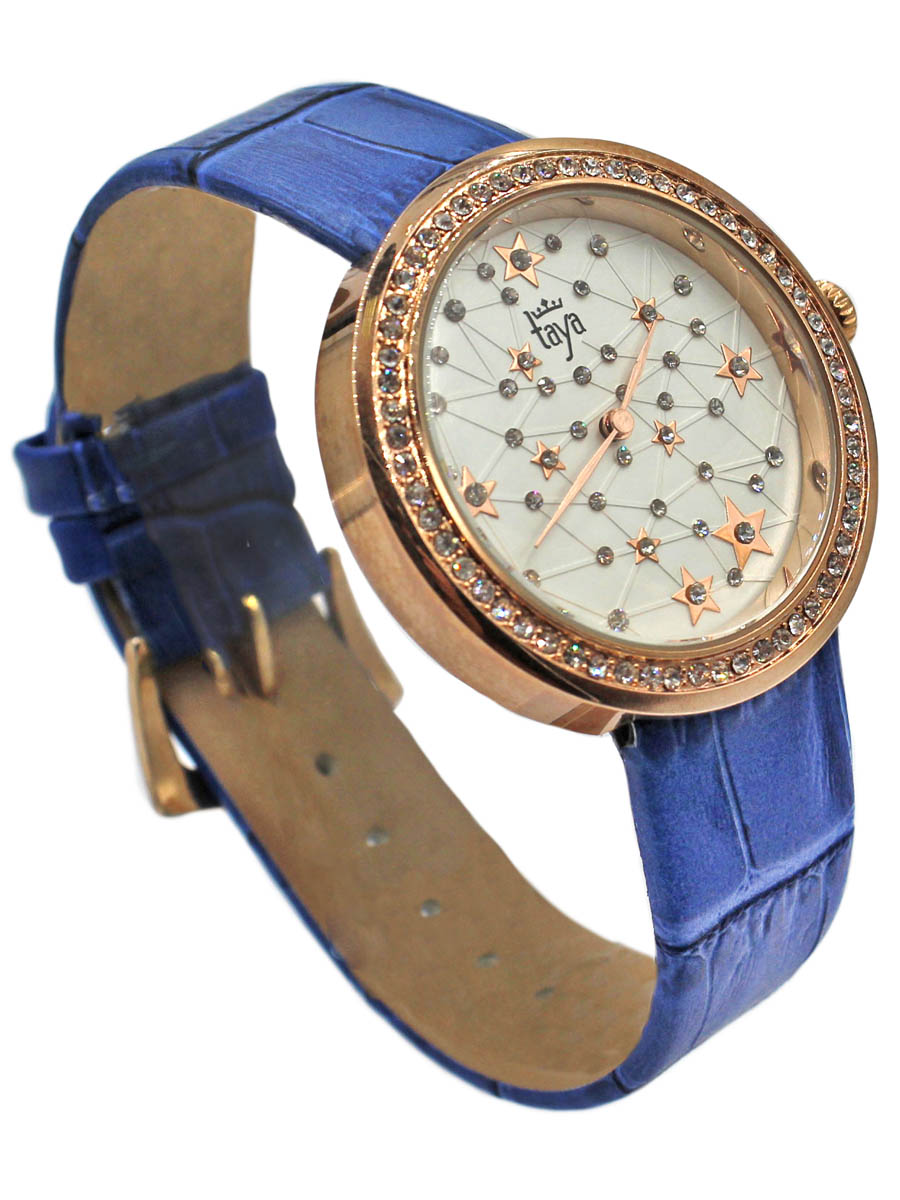 Наручные часы Taya, цвет: золотистый, синий. T-W-0040-WATCH-GL.BLUET-W-0040-WATCH-GL.BLUE Наручные часы Taya, цвет: золотистый, синий. T-W-0040-WATCH-GL.BLUET-W-0040-WATCH-GL.BLUEСтильные часы с серебряным циферблатом со стразами по окружности. Внутри имитация звездного неба с множеством созвездий. Часы наручные электронно-механические кварцевые, аксессуарные, с механической индикацией. Часовой механизм MORIOKA TOKEI inc., Сингапур с питанием от сменного кварцевого элемента питания типа LR626.