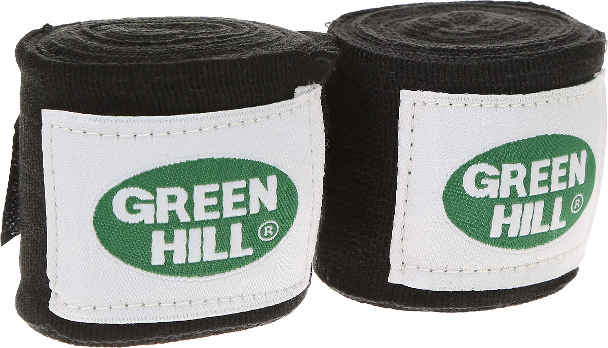 Бинт боксерский Green Hill, цвет: черный, белый, 3,5 м, 2 штВР-6232-35 Бинт боксерский Green Hill, цвет: черный, белый, 3,5 м, 2 штВР-6232-35Боксерский бит Green Hill изготовлен из хлопка с добавлением эластана. Он растягивается, обеспечивает плотное стягивание кистей рук, крепится на липучке. Боксерский бинт используется для бинтования кистей рук, для предотвращения травм суставов пальцев, обеспечивается такая защита путем плотного стягивания пальцев бинтом друг к другу, что создает единую площадь удара и способствует распределению нагрузки. Бинт впитывает пот ладоней, не давая загрязняться внутренней части перчаток. Длина бинтов: 3,5 м. Ширина бинтов: 5 см.