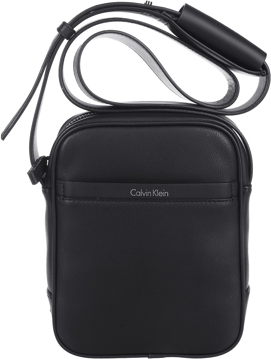 Сумка мужская Calvin Klein Jeans, цвет: черный. K50K502273_0010K50K502273_0010 Сумка мужская Calvin Klein Jeans, цвет: черный. K50K502273_0010K50K502273_0010Стильная мужская сумка Calvin Klein Jeans выполнена из полиуретана. Изделие имеет одно отделение, которое закрывается на застежку-молнию. Внутри сумки расположен нашивной карман. Снаружи, на передней стенке находится нашивной открытый карман. Сумка оснащена плечевым ремнем, который регулируется по длине. Стильная сумка идеально подчеркнет ваш неповторимый стиль.