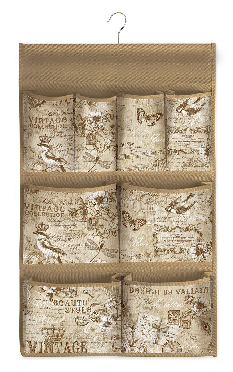Кофр подвесной для хранения Valiant Vintage, с вешалкой, 8 карманов, 36 x 60 смVN-P8 Кофр подвесной для хранения Valiant Vintage, с вешалкой, 8 карманов, 36 x 60 смVN-P8Эксклюзивный дизайн Vintage Collection Специально для Vintage Collection дизайнеры VALIANT разработали оригинальный принт в винтажном стиле. Изящный винтажный дизайн удивительным образом облагораживает все вокруг, привносит в интерьер благородный шик и создает ощущение уюта. Оригинальный дизайн Vintage от VALIANT привносит неповторимый дух романтической старины в современный интерьер. Vintage Collection — стиль, неподвластный времени Неповторимую атмосферу элегантности и шарма в женском гардеробе создаст новая система хранения Vintage Collection. Многофункциональность системы хранения Vintage Collection обеспечивает надежное и бережное хранение вещей. В коллекции удобные чехлы для одежды, короба стеллажные, кофры и органайзеры для хранения вещей. Cистема хранения Vintage Collection определяет широкий модельный ряд: — чехлы для одежды — кофры для хранения — короба стеллажные — органайзеры для белья и аксессуаров. Все модели Vintage Collection удобны в использовании и обеспечивают...